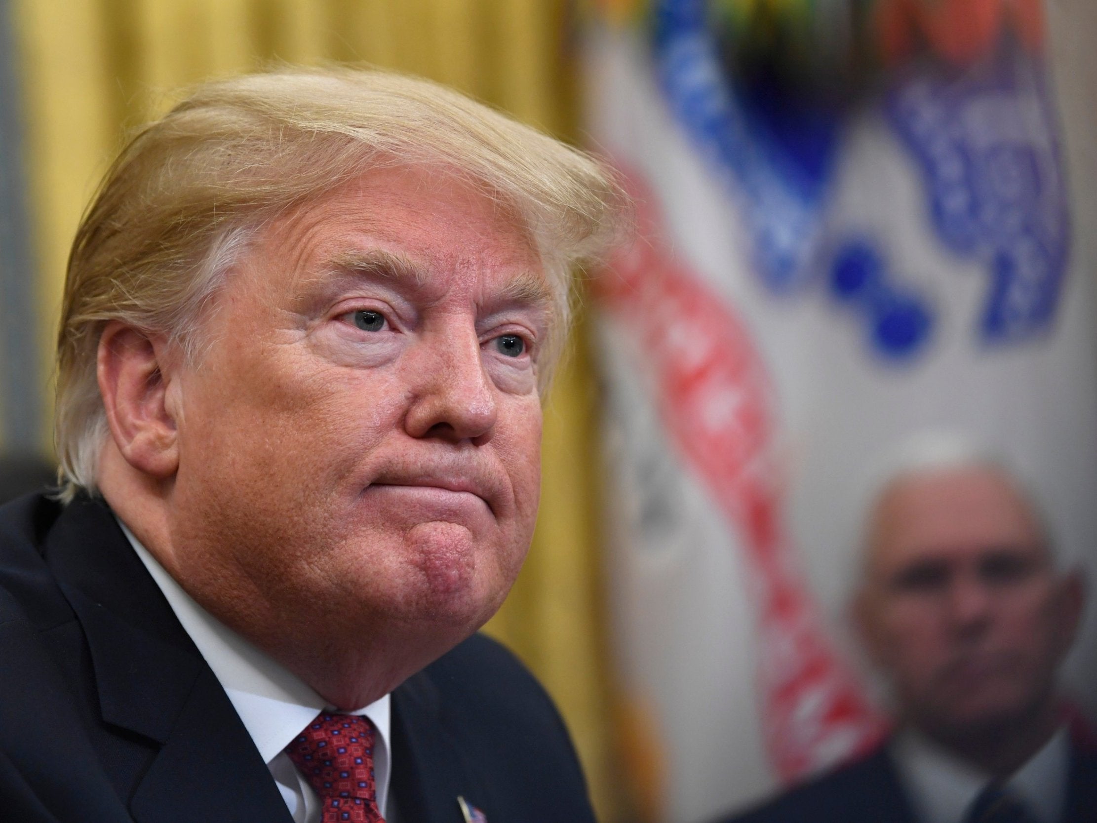 Donald Trump at the White House Oval Office with vice president Mike Pence