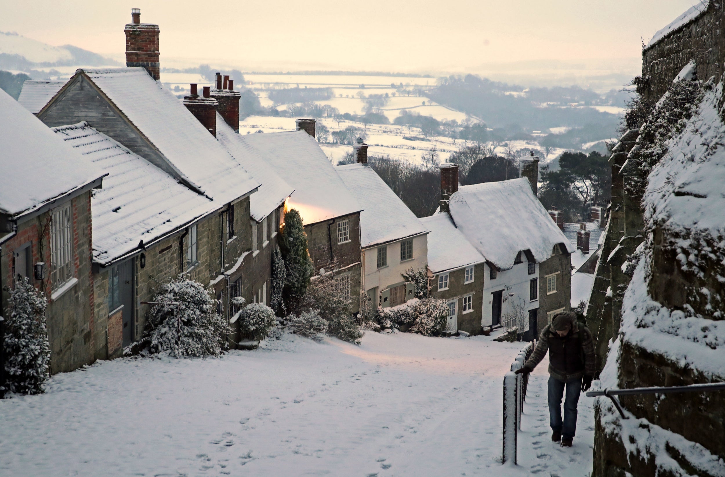 Snow covers houses in Gold Hill, in Shaftesbury, Dorset