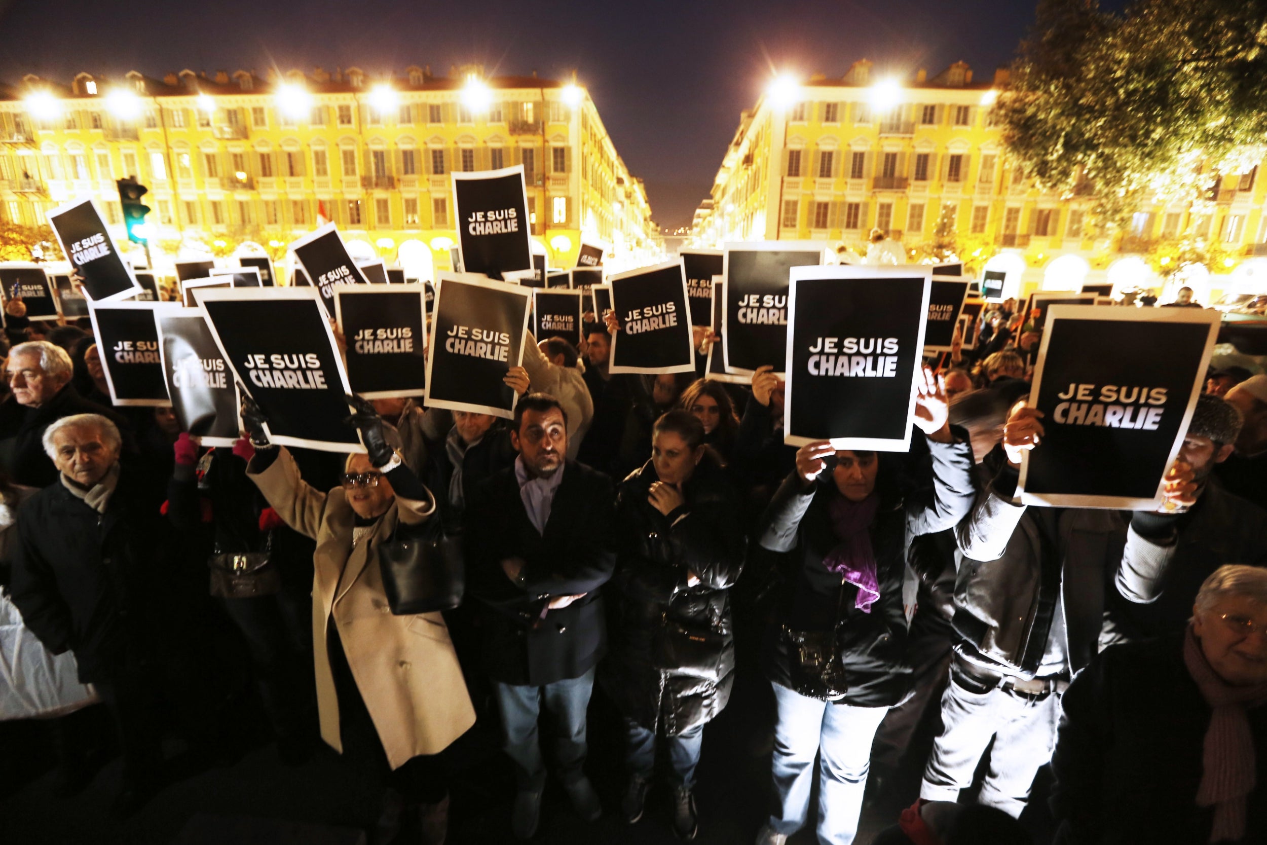 Mourners stand in solidarity with Charlie Hebdo with the slogan ‘Je Suis Charlie’ after the January 2015 attacks