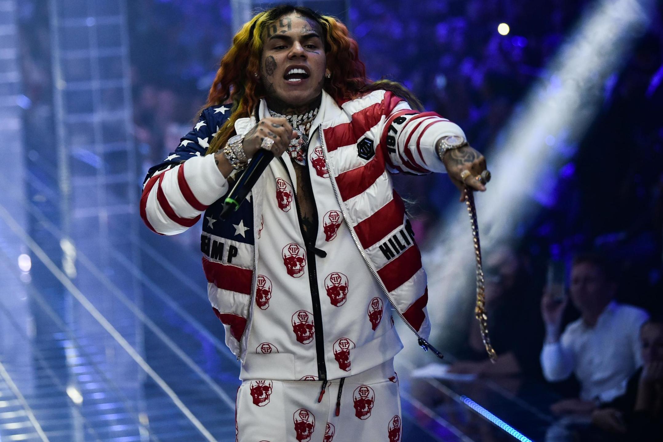 Tekashi 6ix9ine performs during the Philipp Plein fashion show as part of the Women's Spring/Summer 2019 fashion week in Milan, on 21 September, 2018.