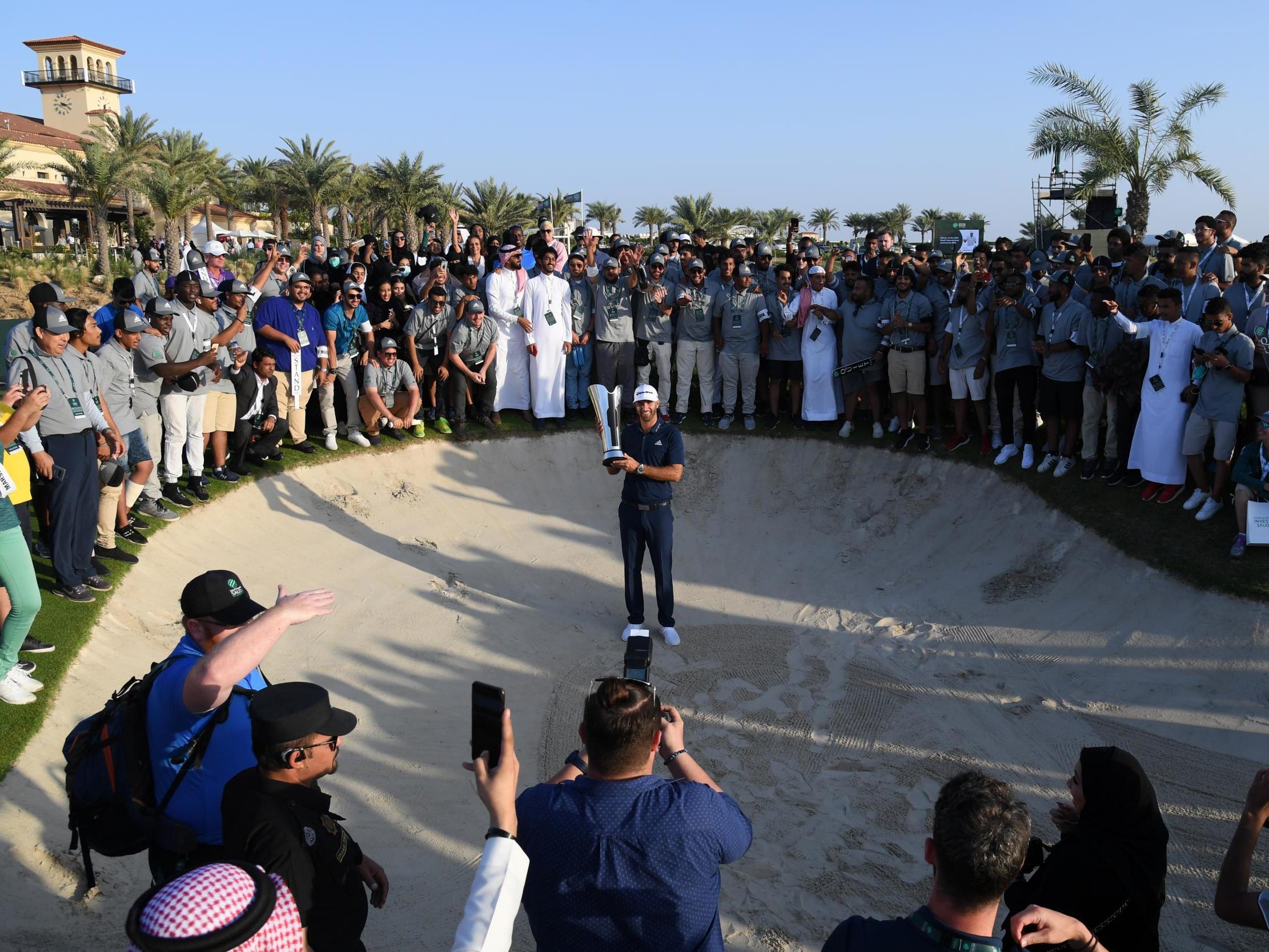 Dustin Johnson celebrates his victory at the Royal Greens Golf & Country Club