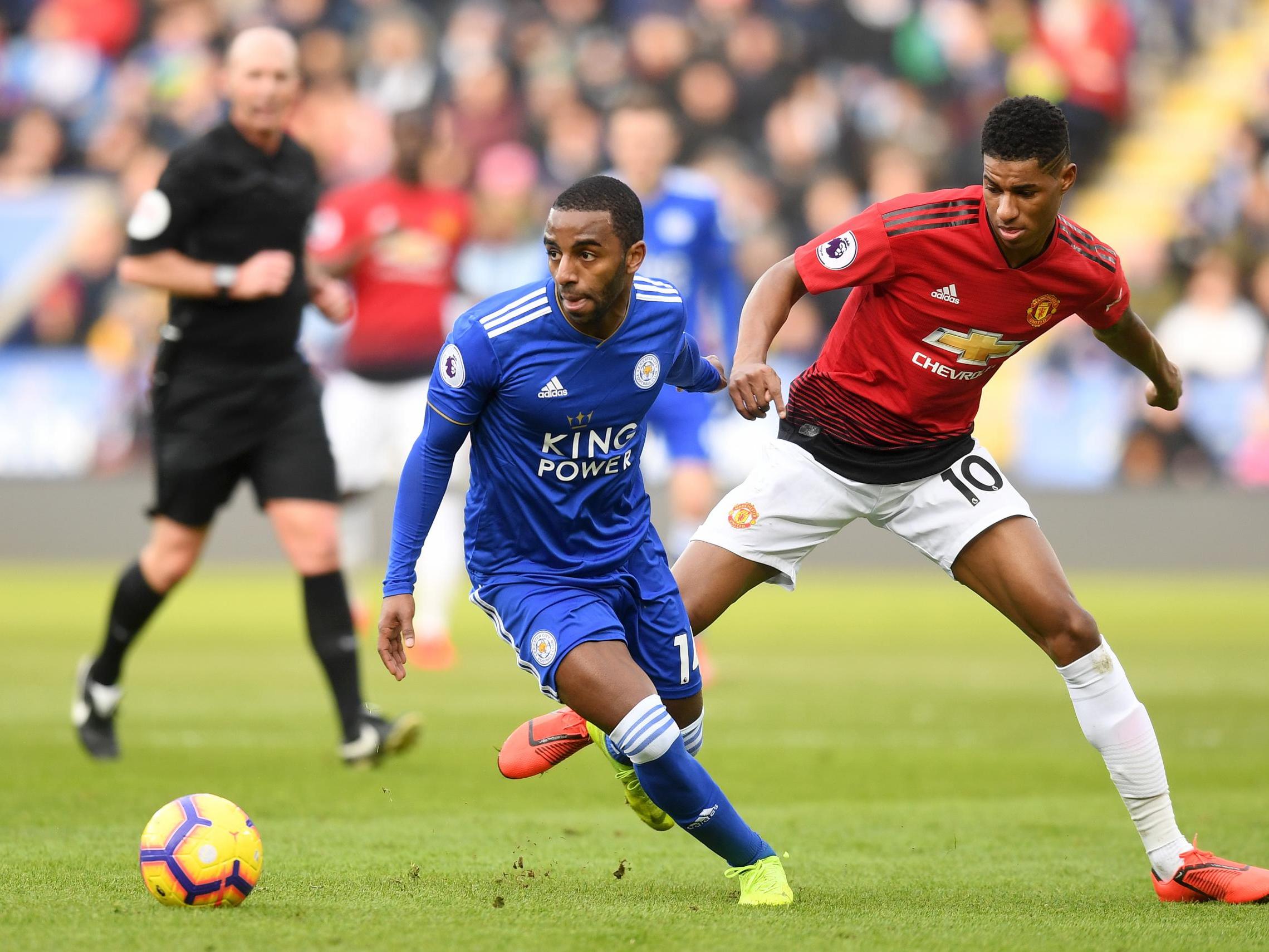 Ricardo Pereira turns to get away from Marcus Rashford