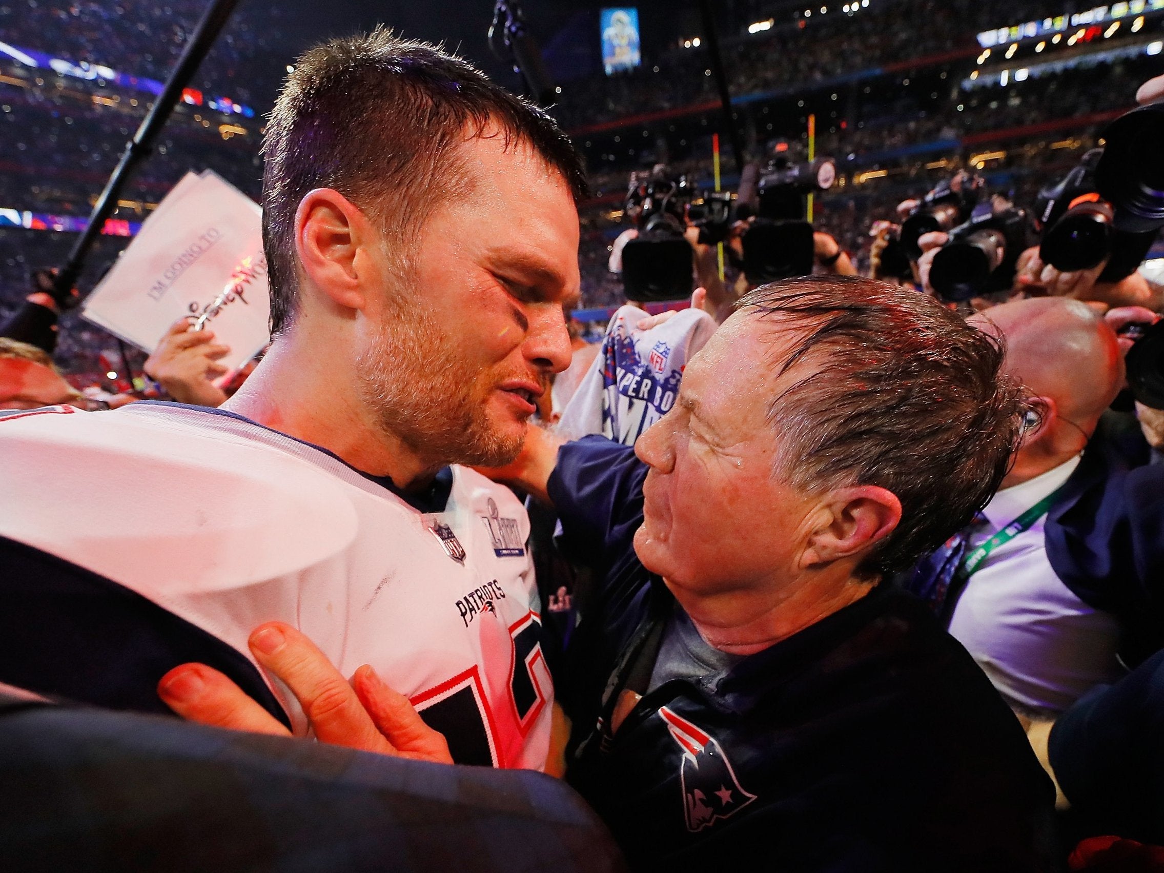 Tom Brady and Bill Belichick embrace after New England's Super Bowl win over the LA Rams