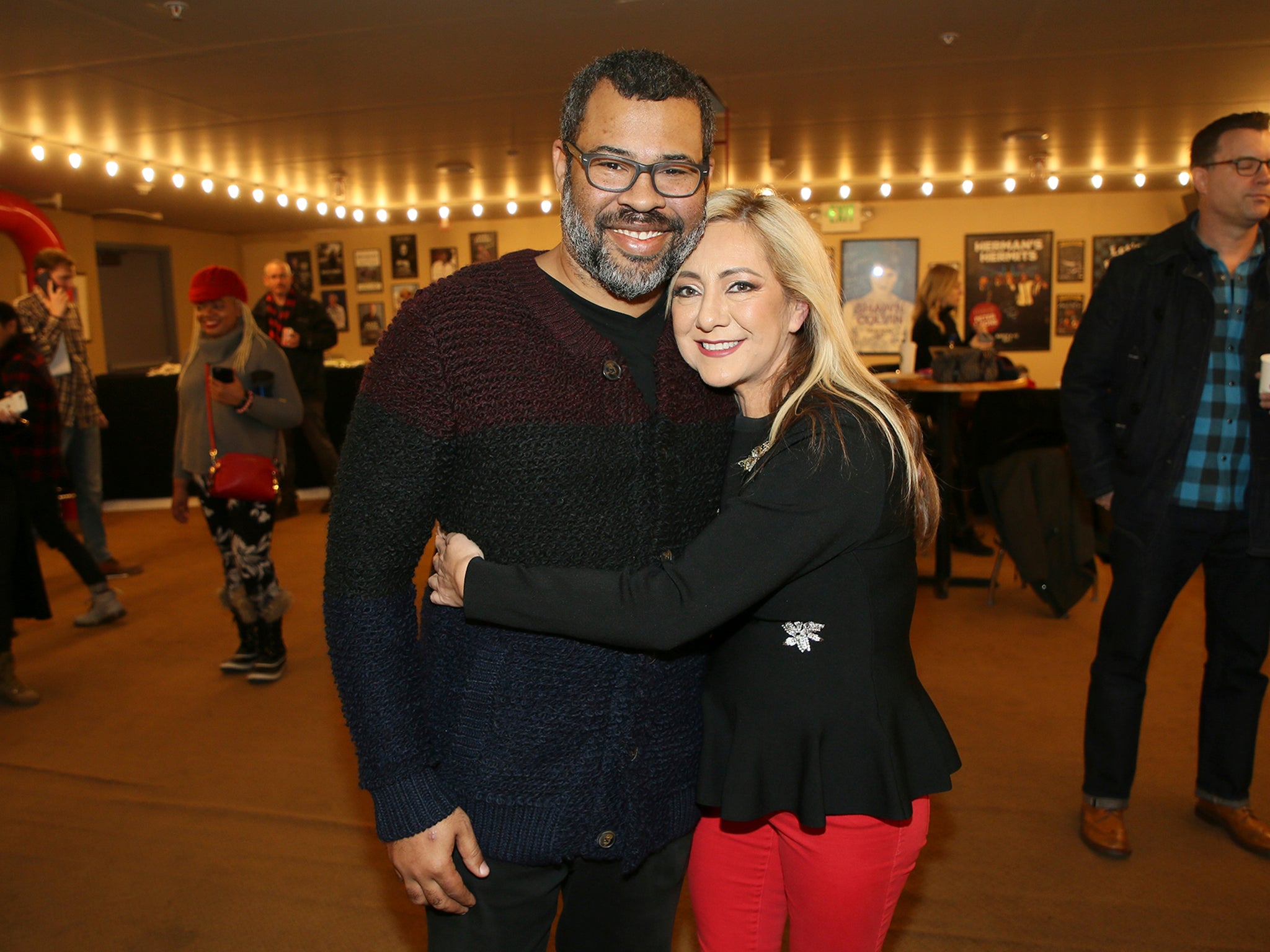 Jordan Peel and Lorena Gallo hug at the premiere of the film ‘Lorena’ during the 2019 Sundance Film Festival