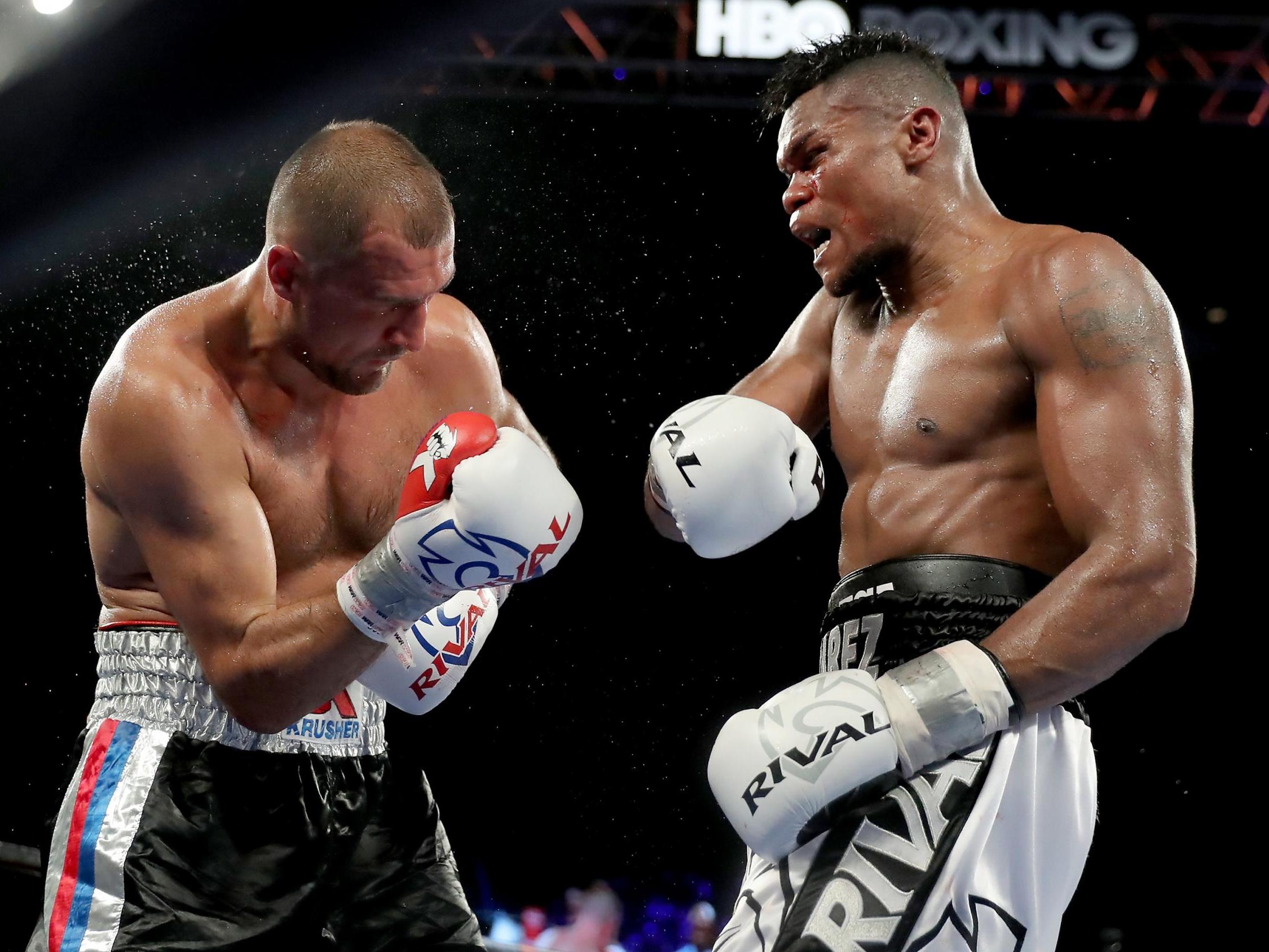 Sergey Kovalev and Eleider Alvarez in action last August