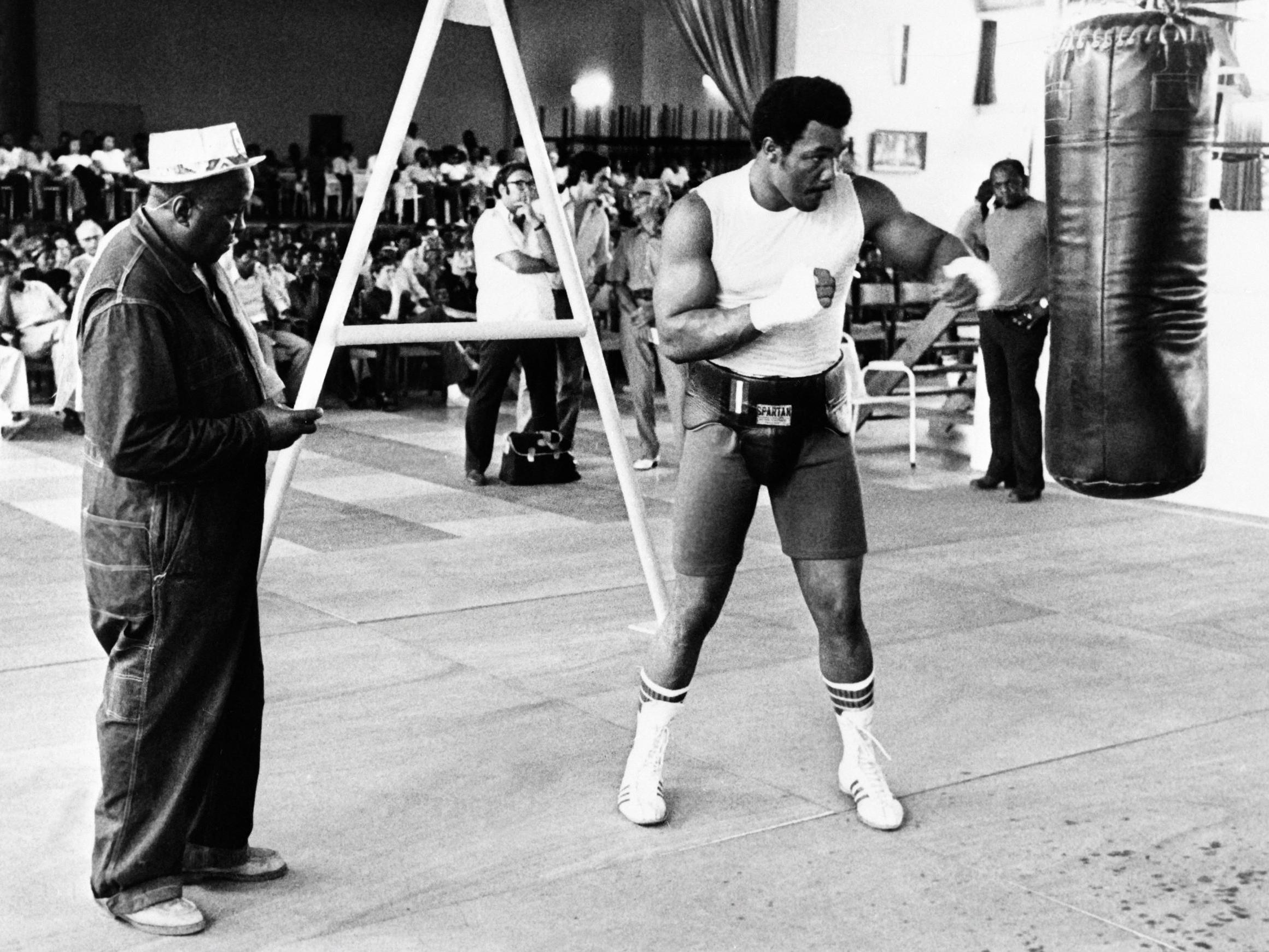 George Foreman in training ahead of his life-defining fight against Muhammad Ali in 1974