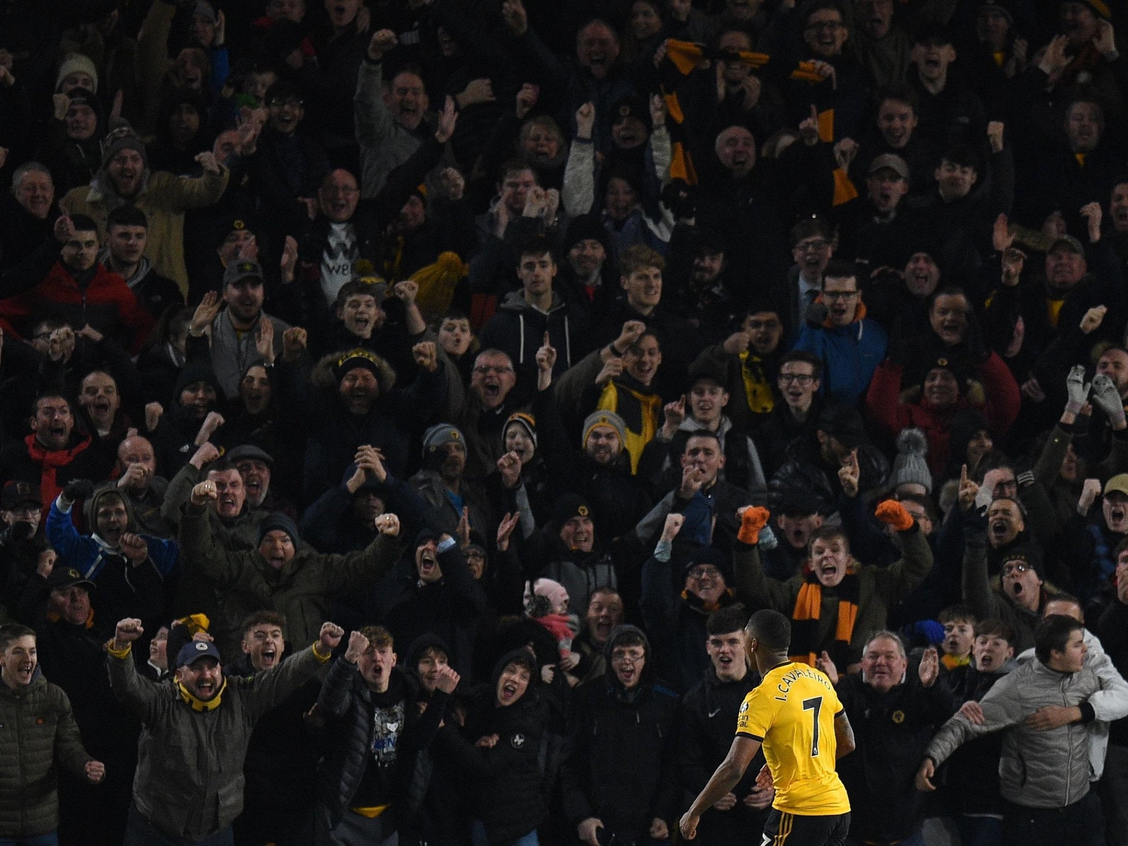 Ivan Cavaleiro celebrates with fans after scoring the winner