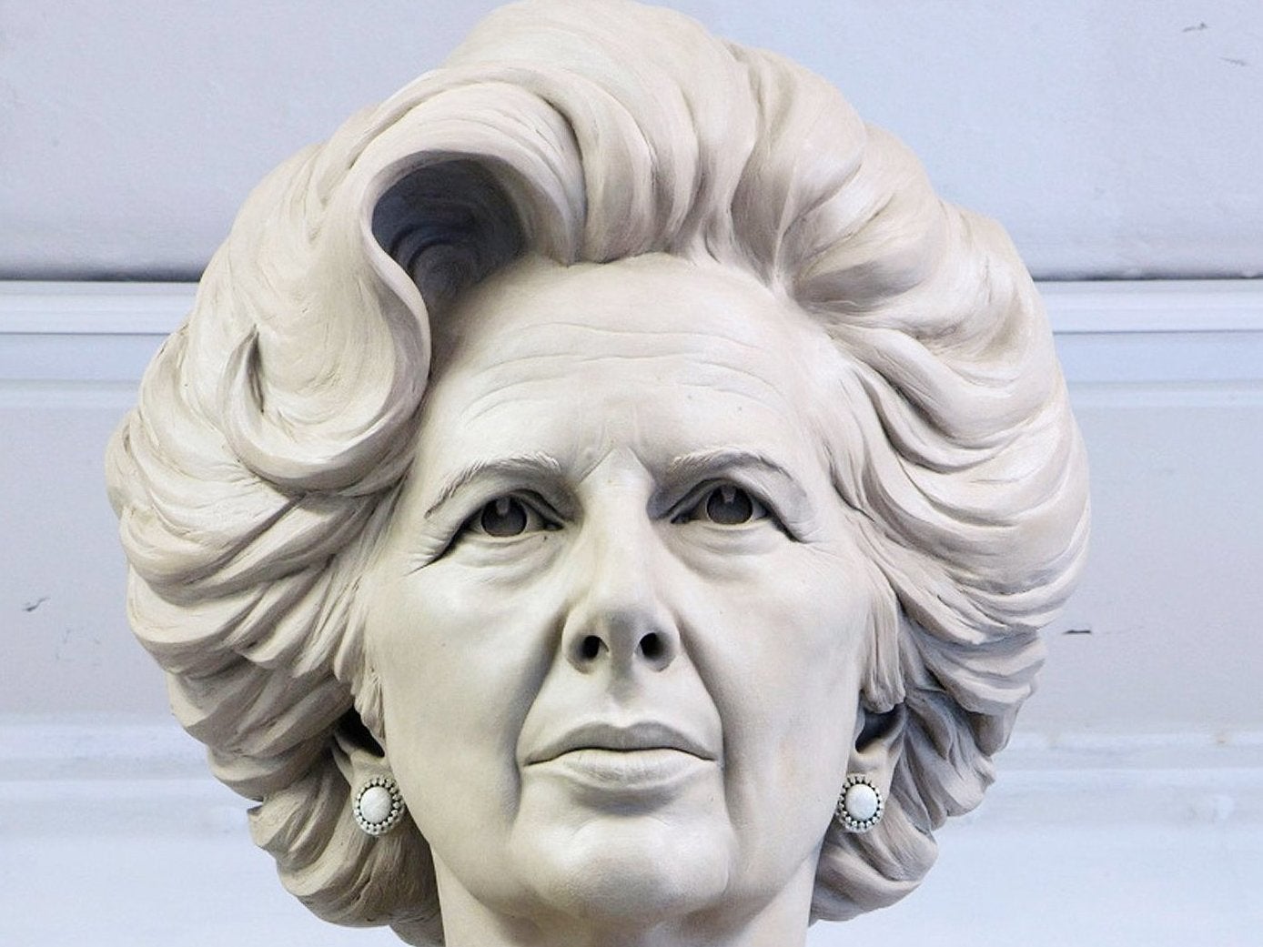 Bronze statue of former prime minister will be placed on 10ft-high plinth due to fears about vandalism, making entire sculpture over 20ft tall