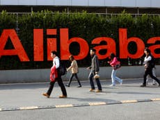 Alibaba delays $15bn stock market listing amid Hong Kong protests, say reports