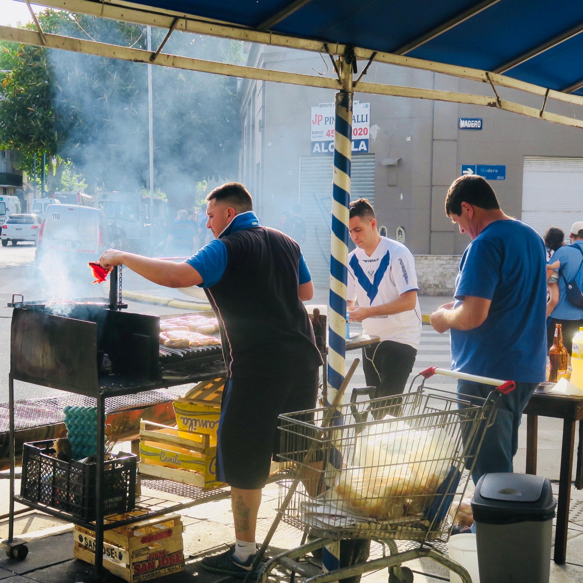 A choripan vendor feeds fans outside Velez Sarsfield's stadium in Buenos Aires