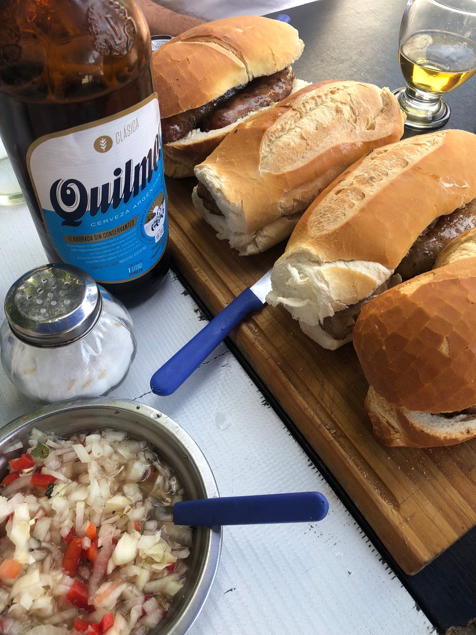 Choripans are served outside football matches in Argentina by street vendors