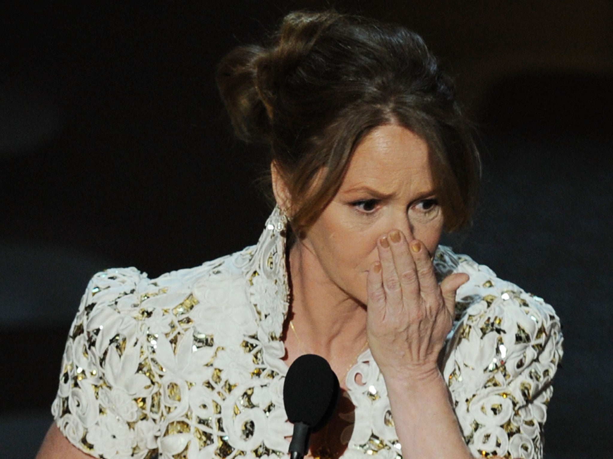 Leo at the 2011 Oscars, accepting the award for Best Supporting Actress