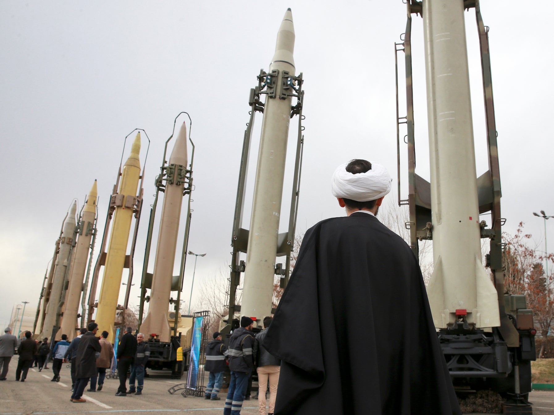 An Iranian cleric looks on at a military show marking the 40th anniversary of Iran’s Islamic Revolution