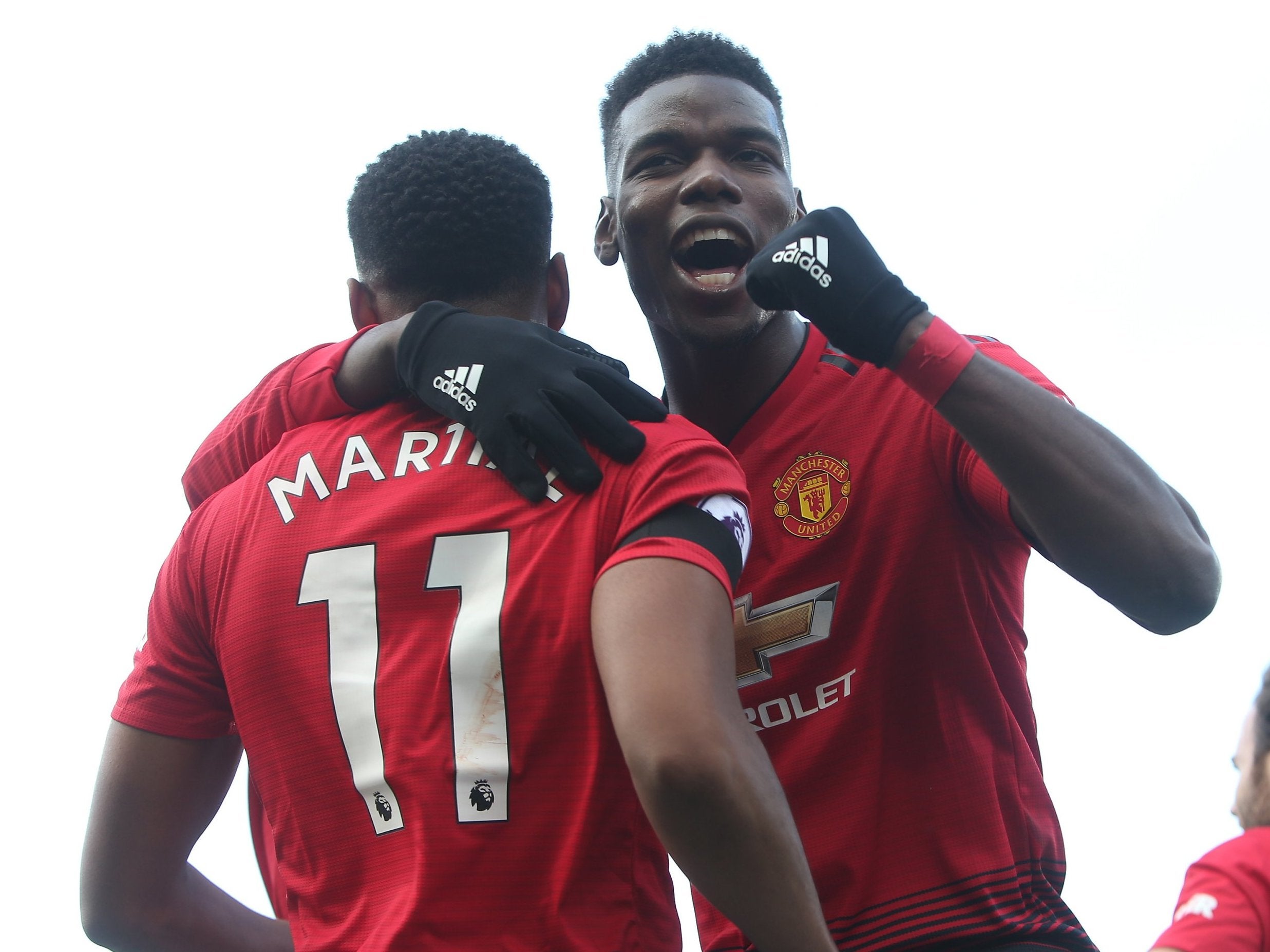 Anthony Martial celebrates scoring with Paul Pogba