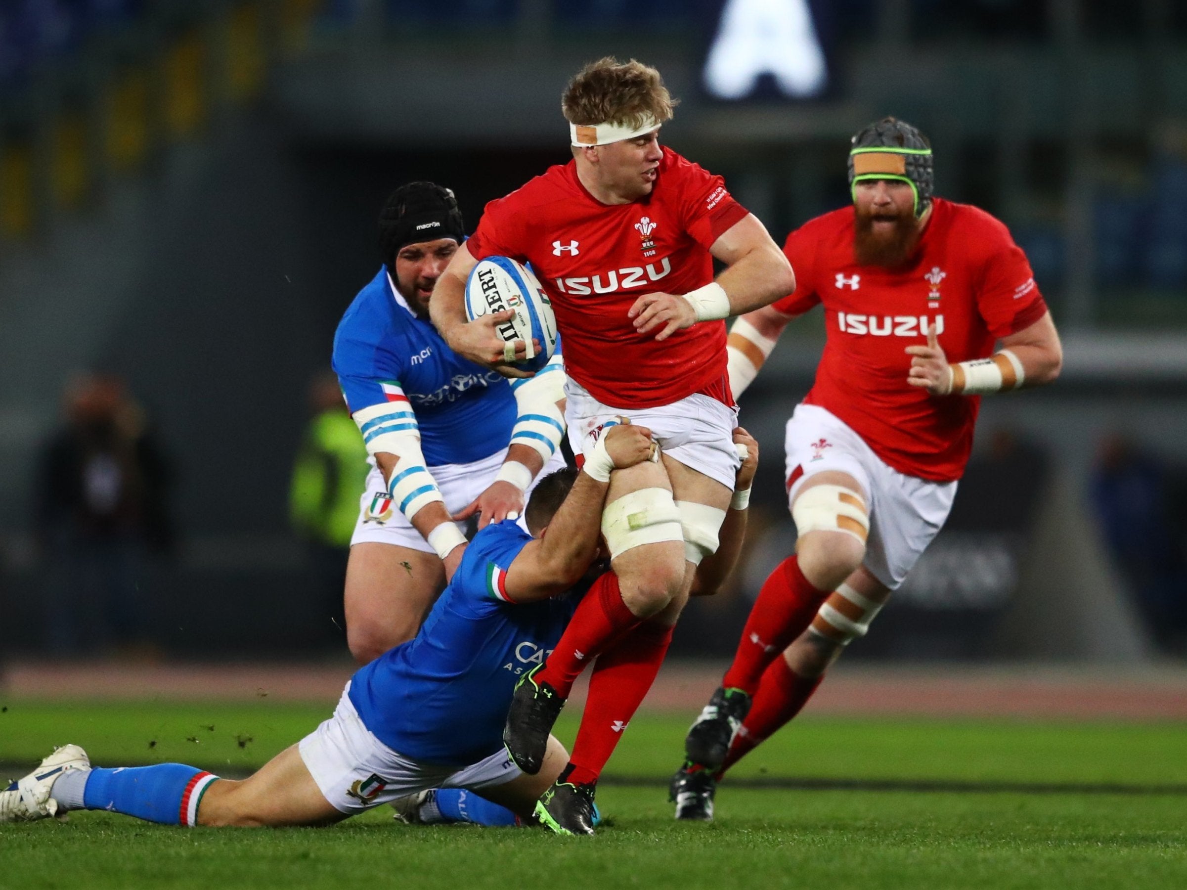 Aaron Wainwright is tackled during Wales' Six Nations clash with Italy