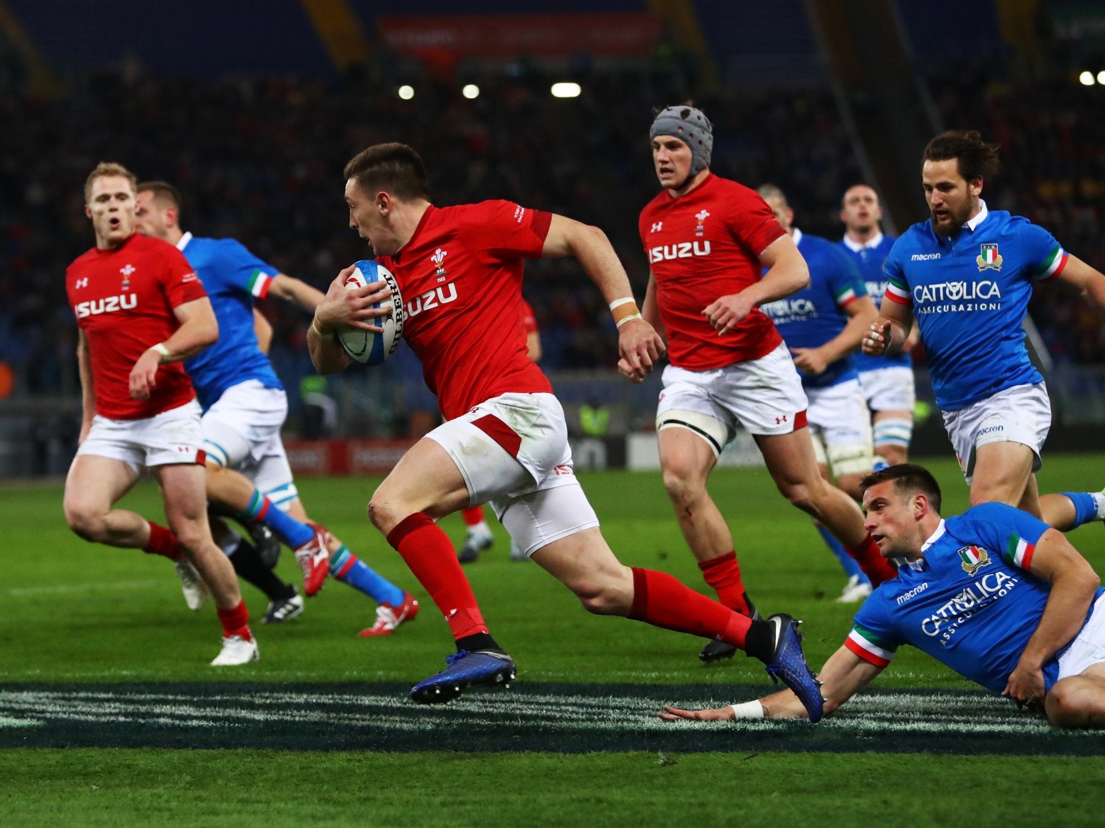 Josh Adams runs in for Wales' opening try against Italy