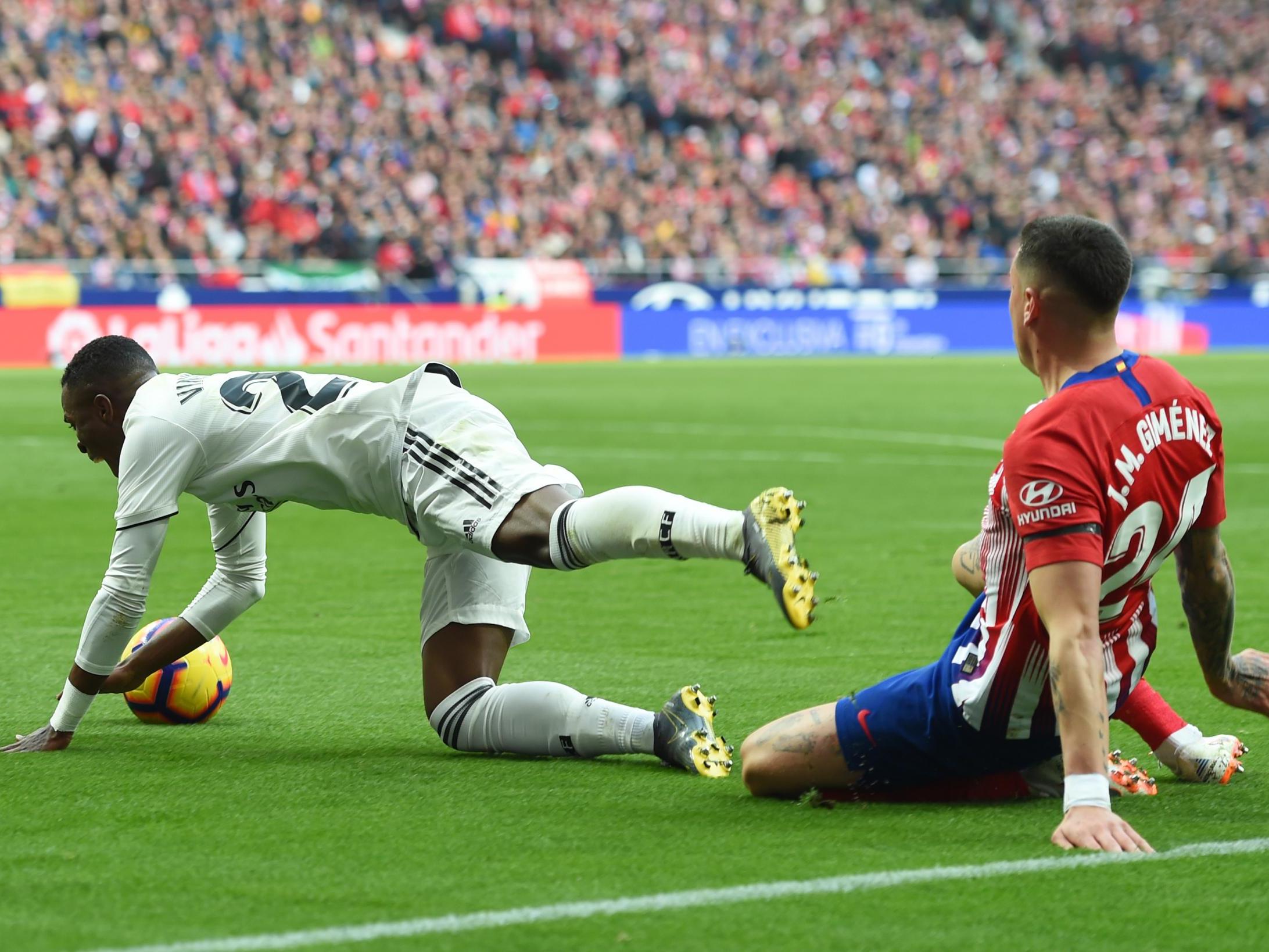 Vinicius Jr is fouled by Jose Gimenez