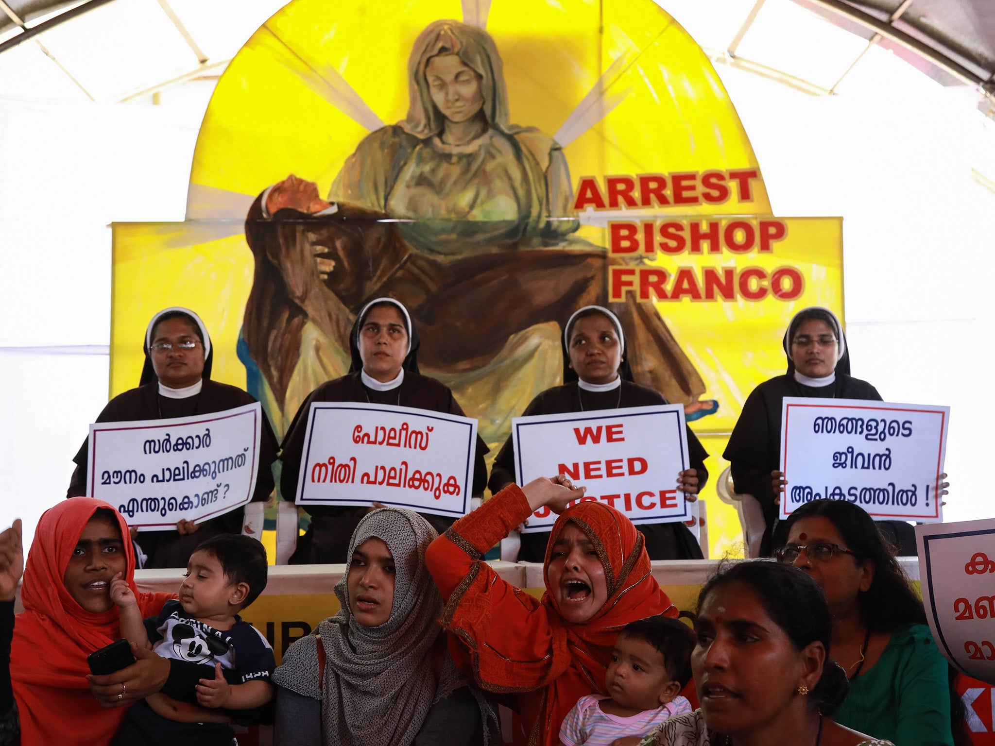 Christian nuns and Muslim supporters demand the arrest of Bishop Franco Mulakkal, who is accused of raping a nun, in a protest outside the High Court in Kochi in Kerala