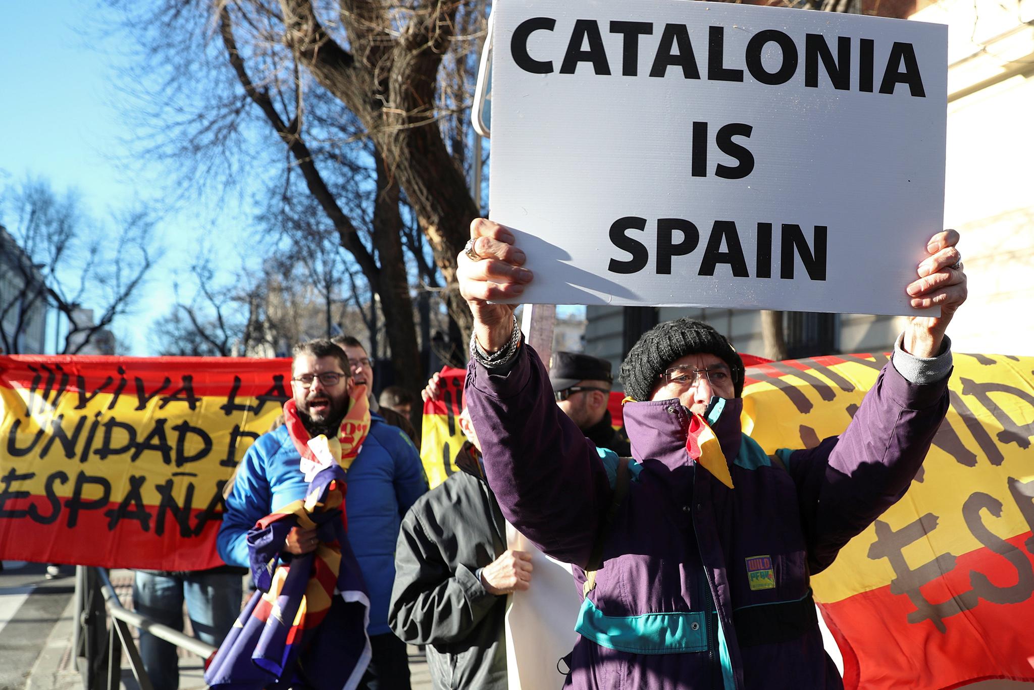 Pro-union protesters demonstrate outside the Supreme Court in Madrid