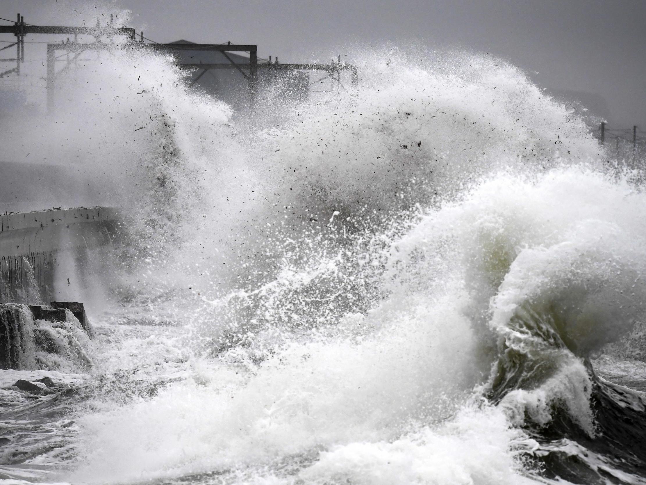 Waves crash into a seafront in Satcoats, Scotland