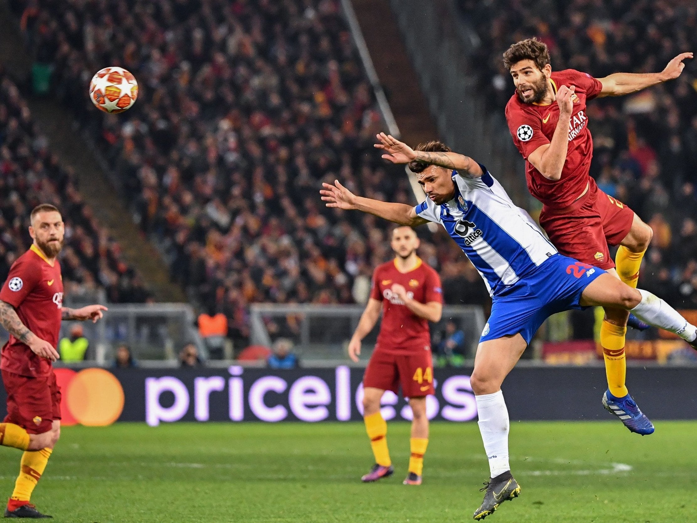 Roma's Federico Fazio wins a header