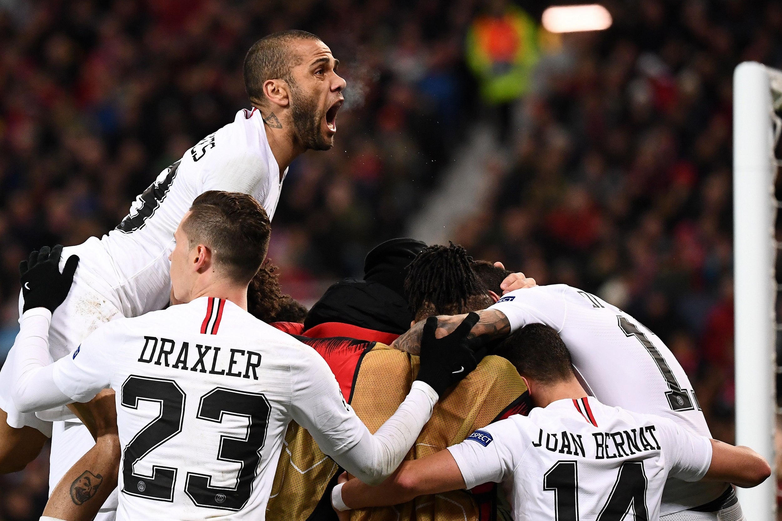 PSG celebrate at Old Trafford (AFP/Getty)