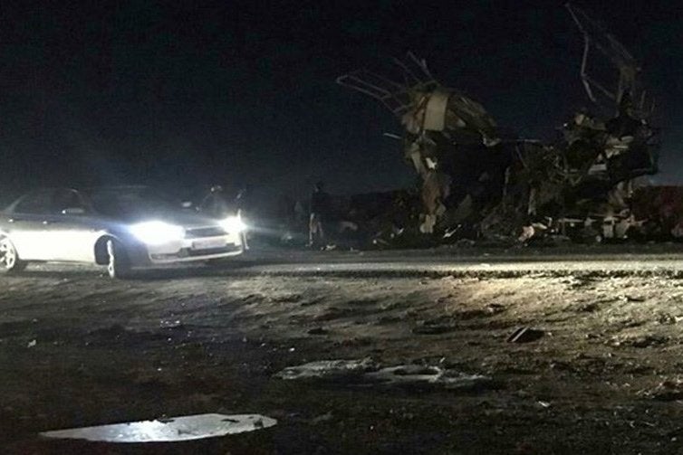 A handout photo made available by the Iranian local Fars News agency shows the scene of suicide bombing explosion in Sistan-Baluchestan province on Wednesday