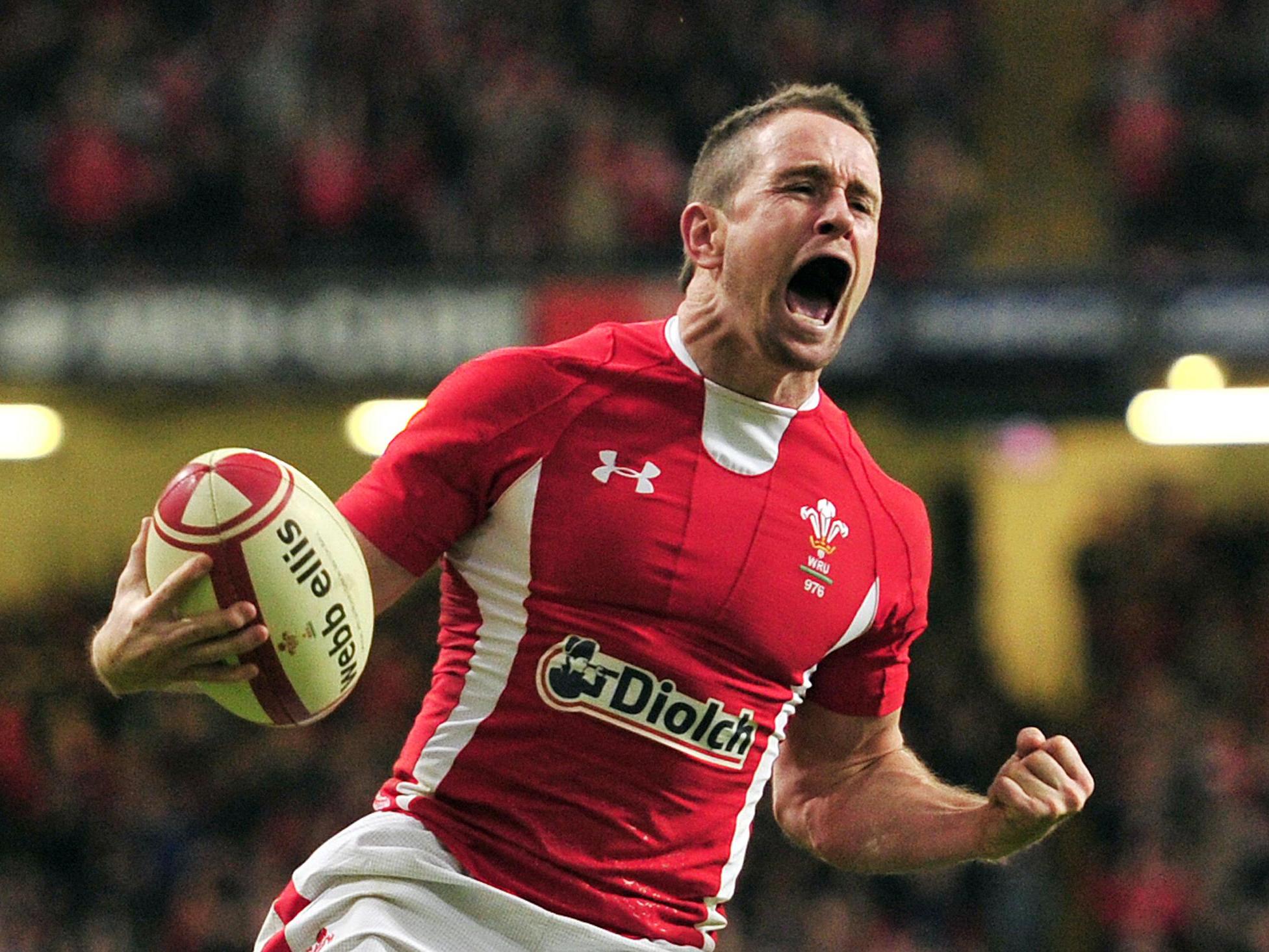 Shane Williams celebrates during his final appearance for Wales