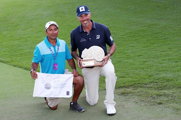 Kuchar and his caddy David Giral Ortiz