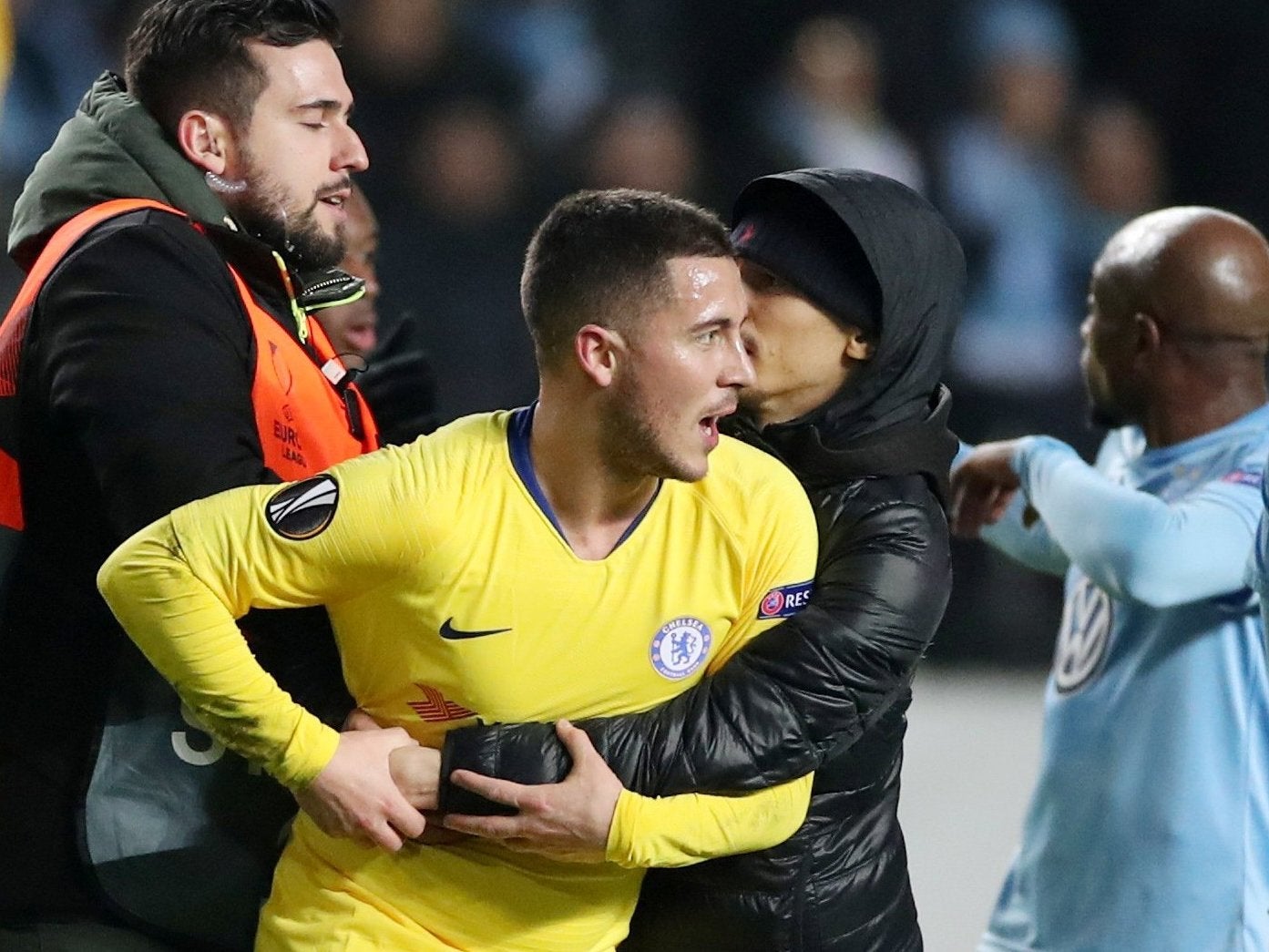 Eden Hazard is approached by a pitch invader