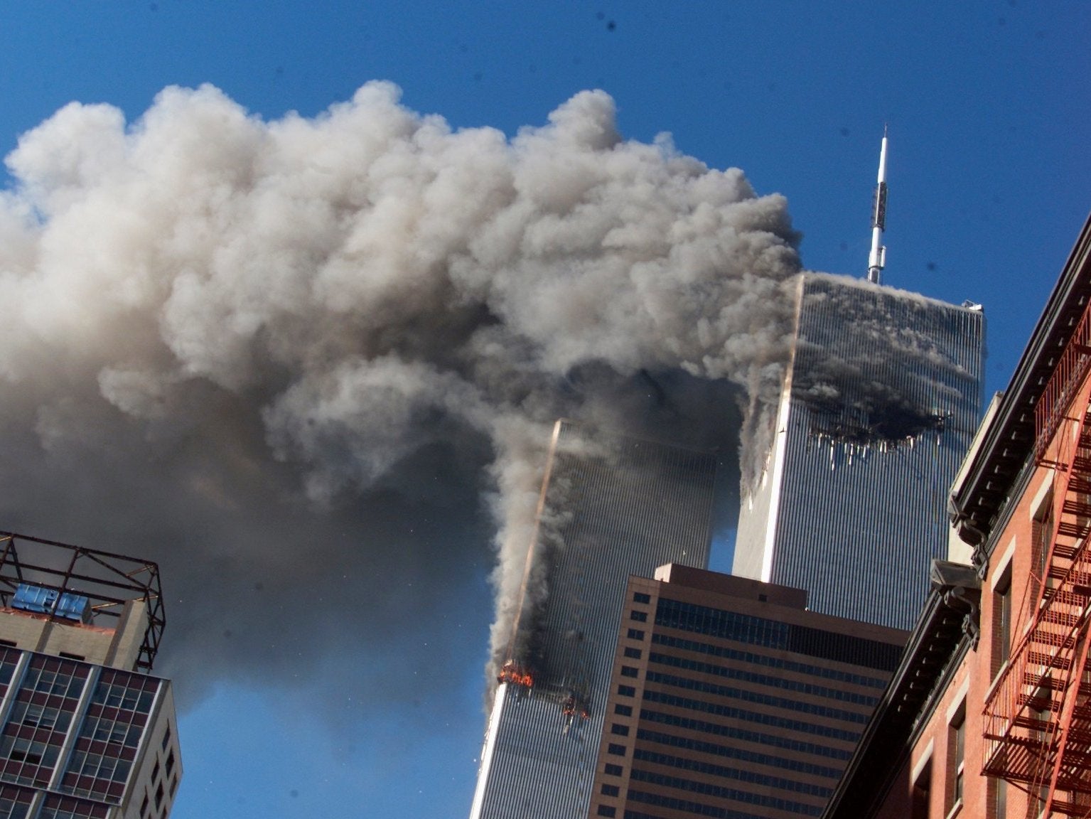 Burning twin towers of the World Trade Centre after hijacked planes crashed into towers