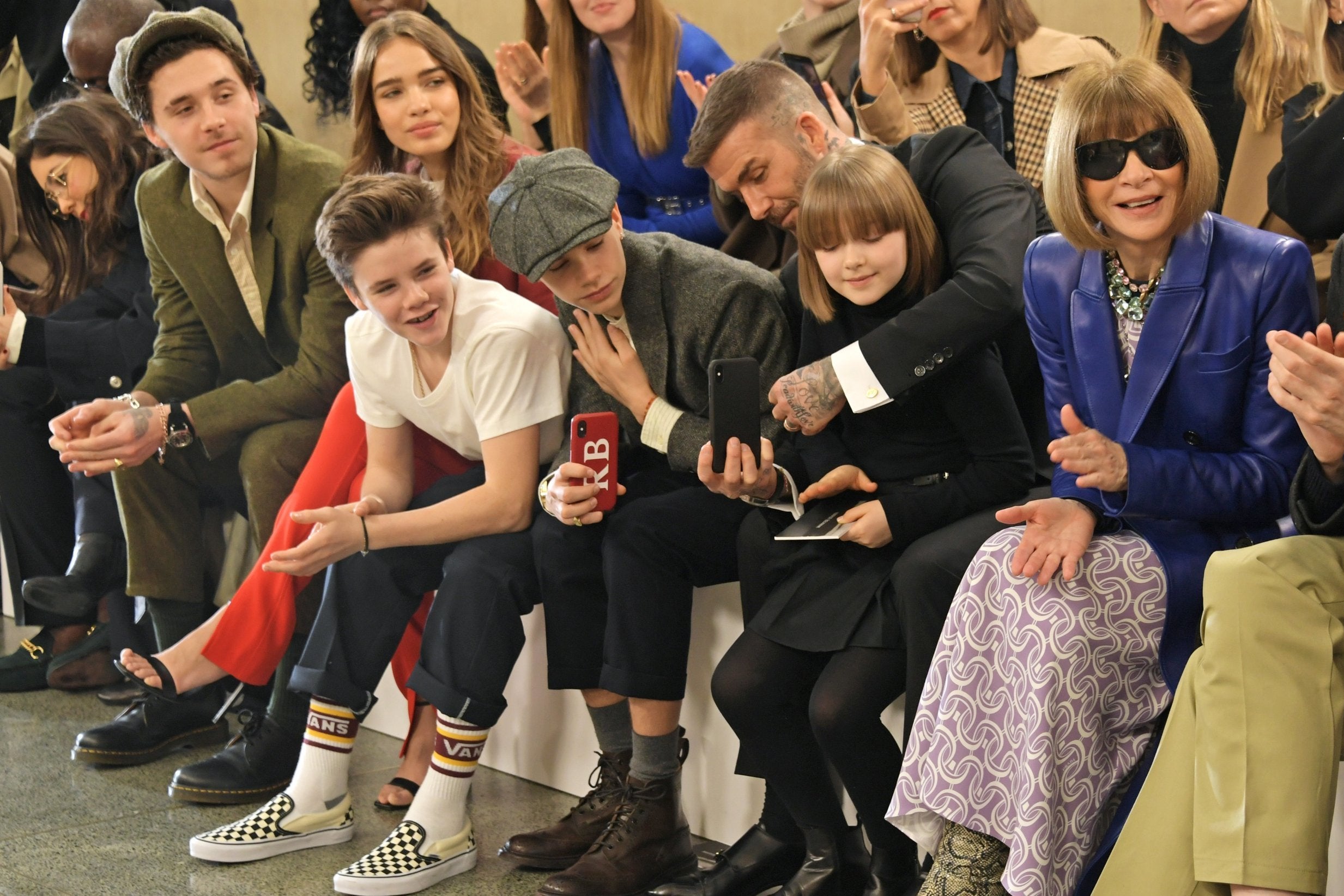 Brooklyn Beckham, Cruz Beckham, Hana Cross, Romeo Beckham, David Beckham, Harper Beckham and Dame Anna Wintour sat on the front row.