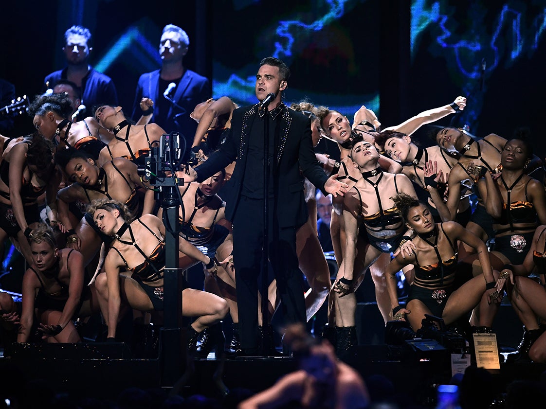 Robbie Williams performs at the Brits in 2017 – the year he won Outstanding Contribution to Music (Getty)