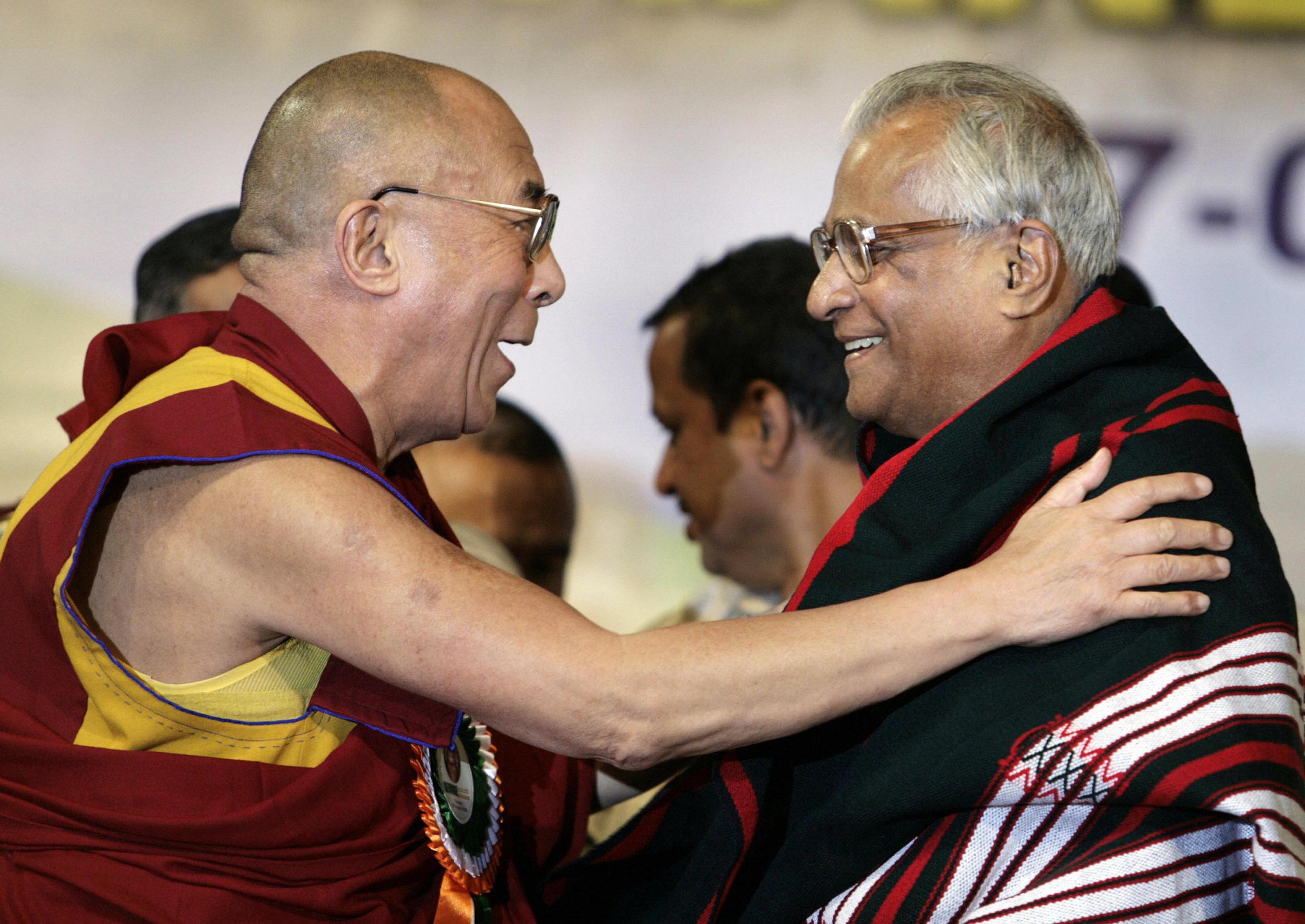 Fernandes in Bangalore in 2008, greeted by his friend the Dalai Lama