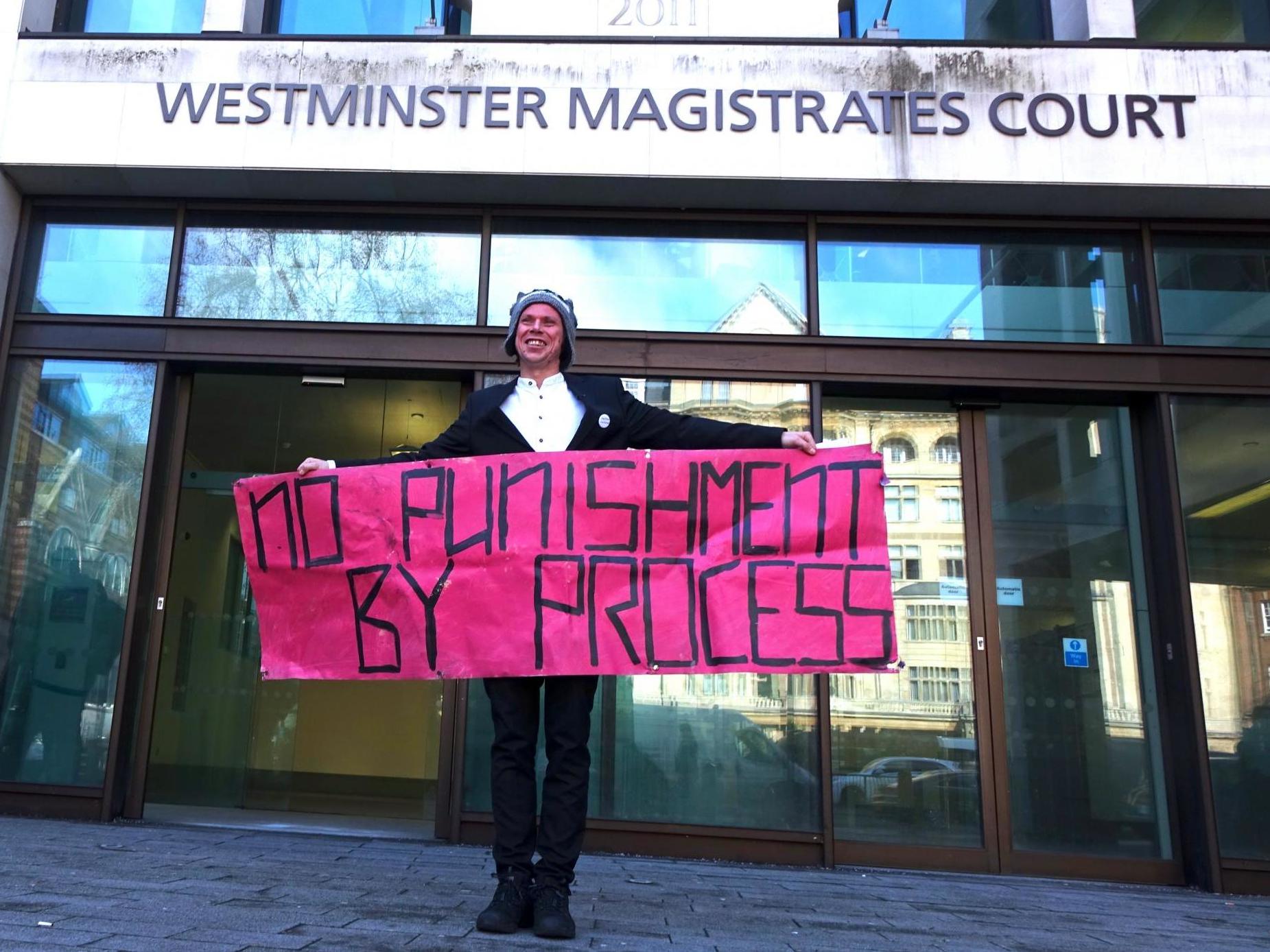 Lauri Love poses outside Westminster Magistrates Court on 19 February 2019 after a judge rules he will not get his computer equipment back