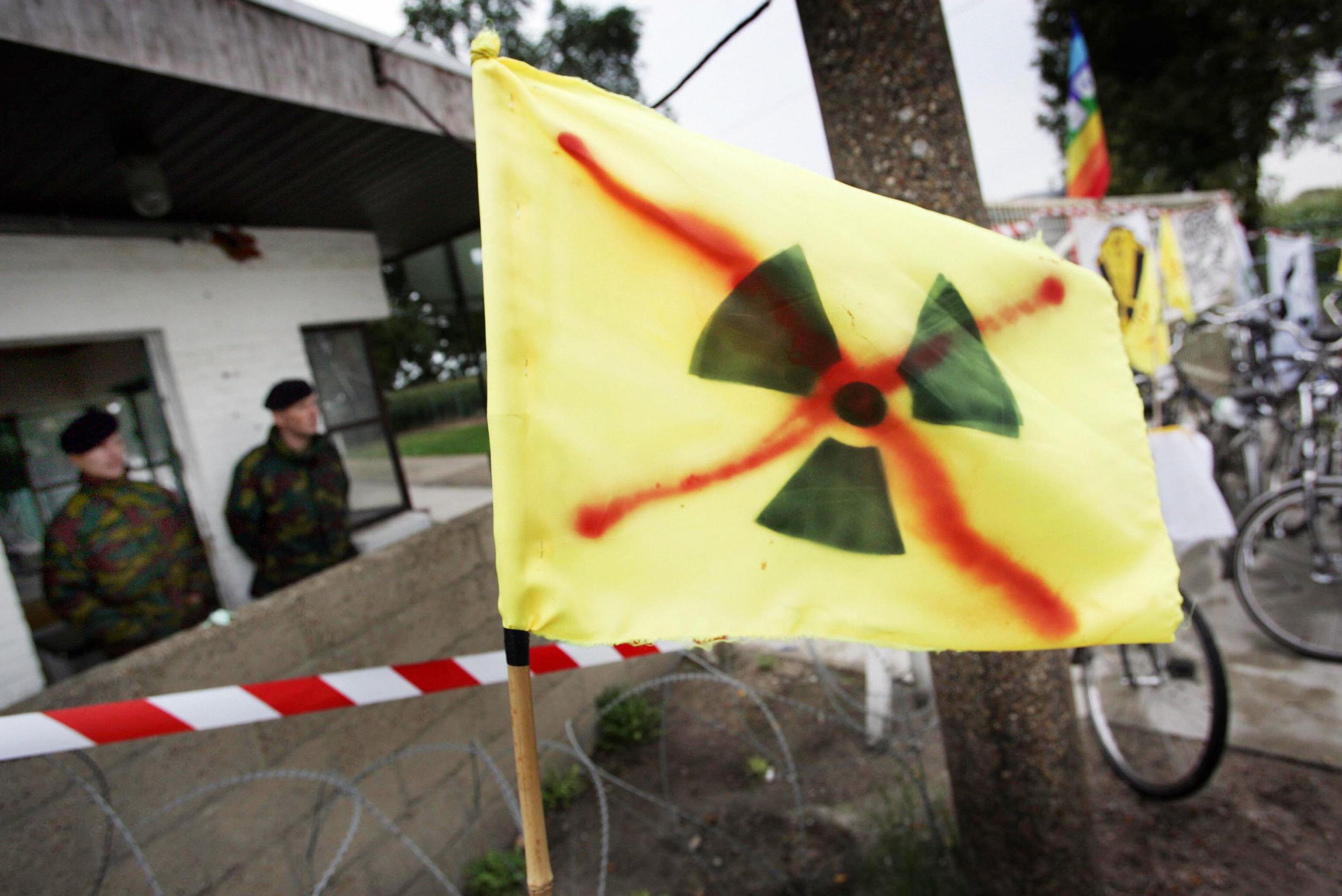 Soldiers stand guard during a previous demonstration at Kleine Brogel nuclear base