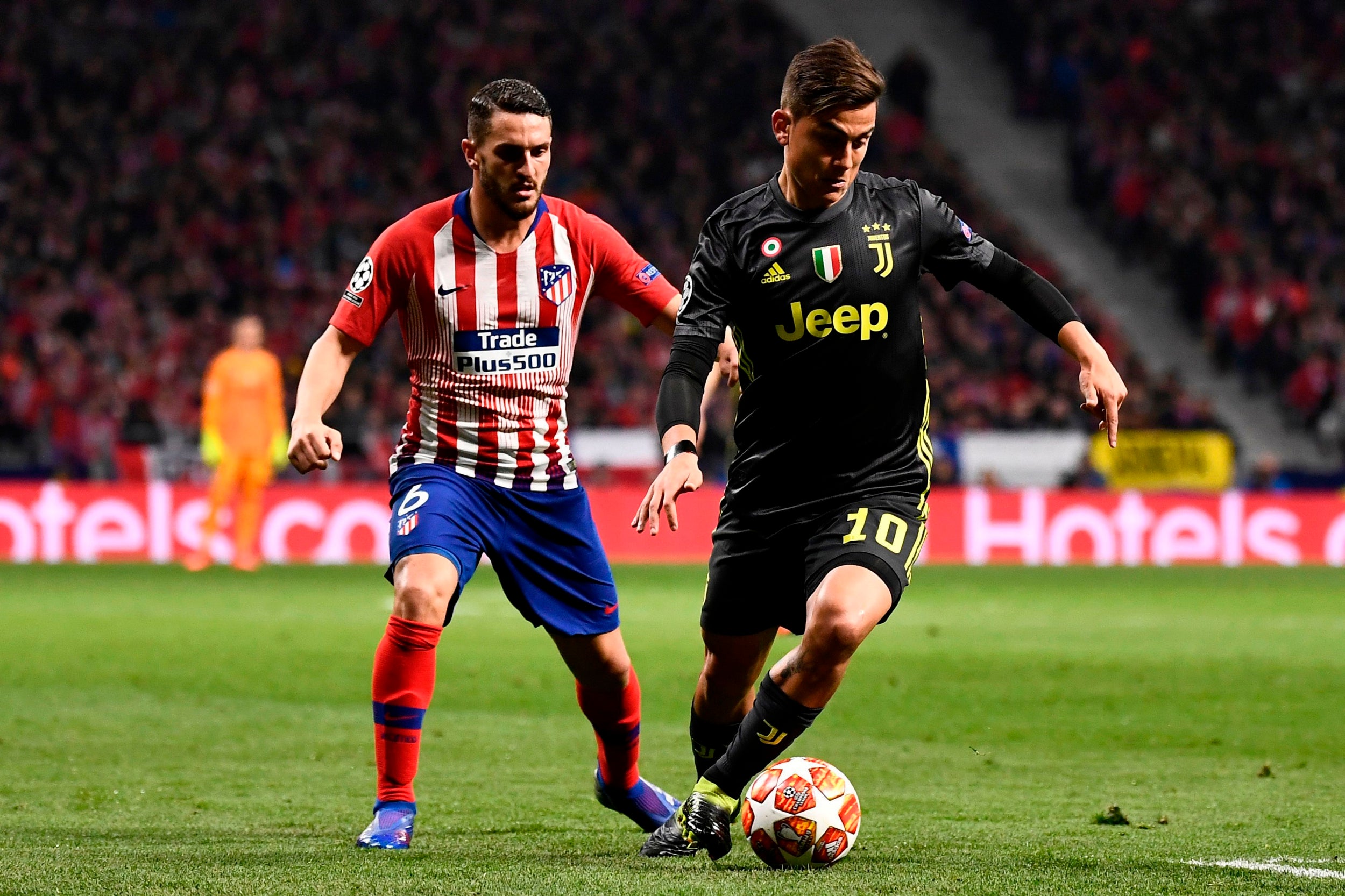 Koke tracks Dybala (AFP/Getty)