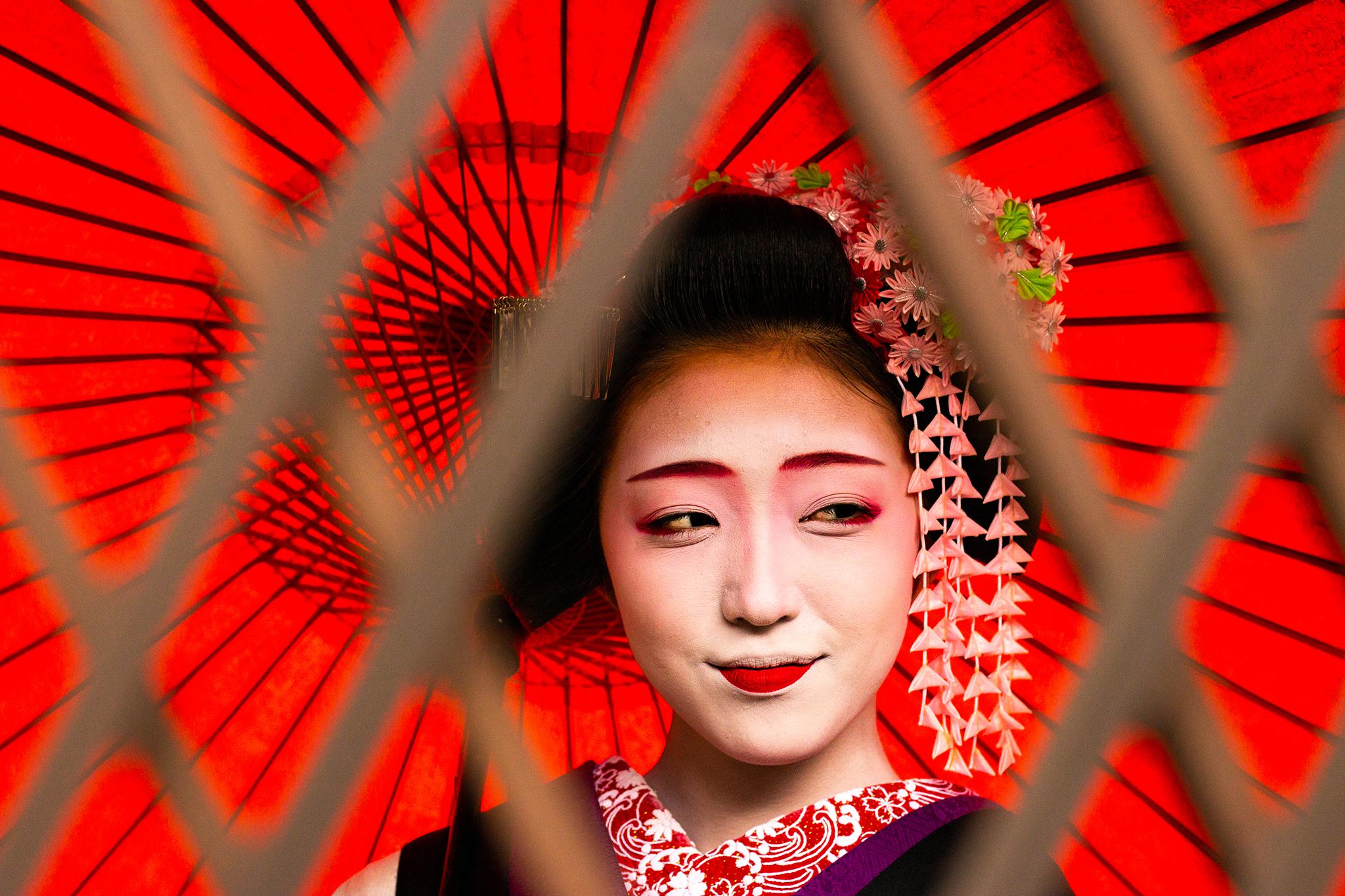 "This 17-year-old girl has been training to become a geisha for the past two years. Until she qualifies, she wears half-painted lips, signalling to her clientele that she’s still learning" - Sharon Kynaston