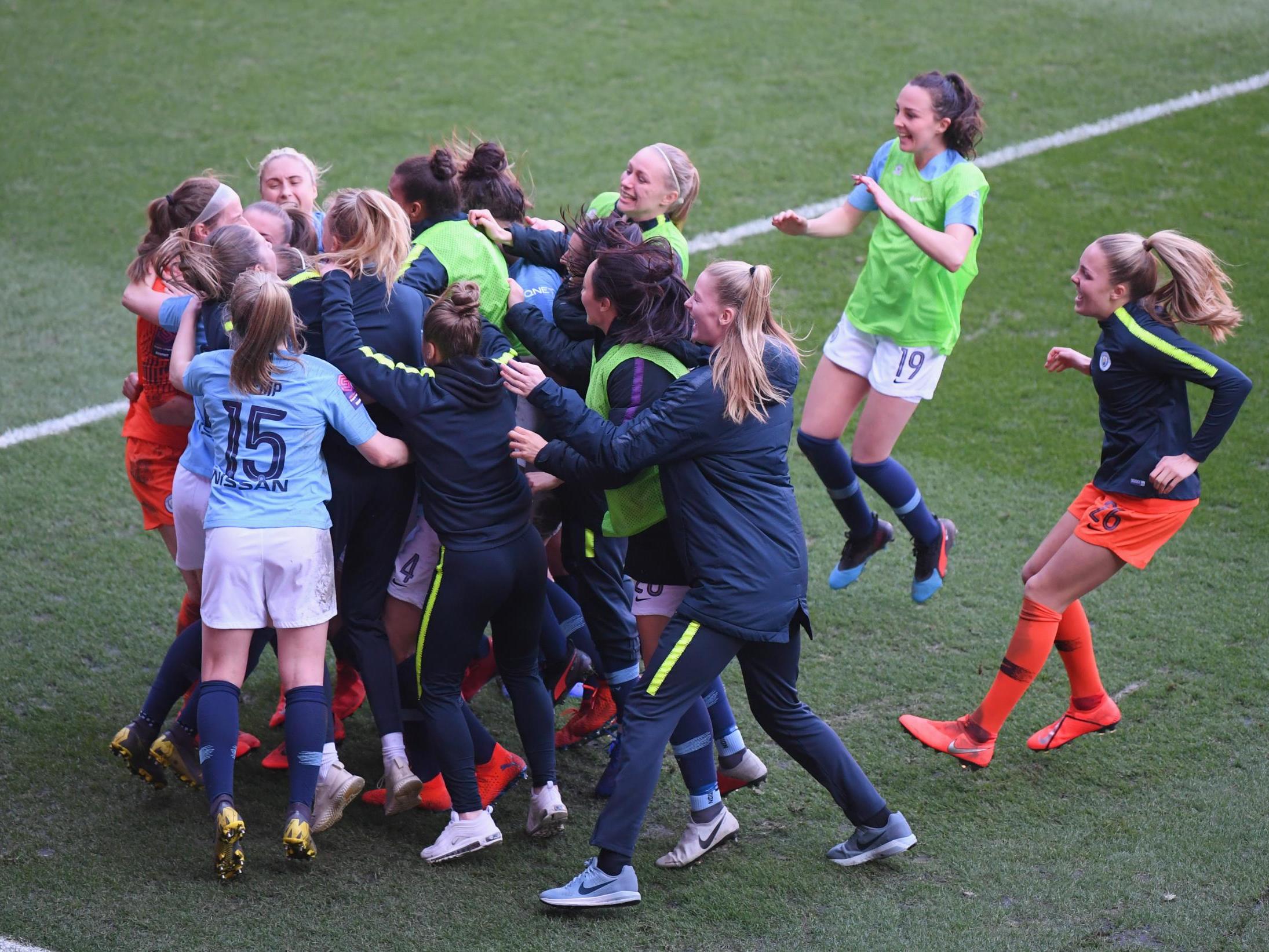 Manchester City Women celebrate after securing victory in the penalty shoot-out