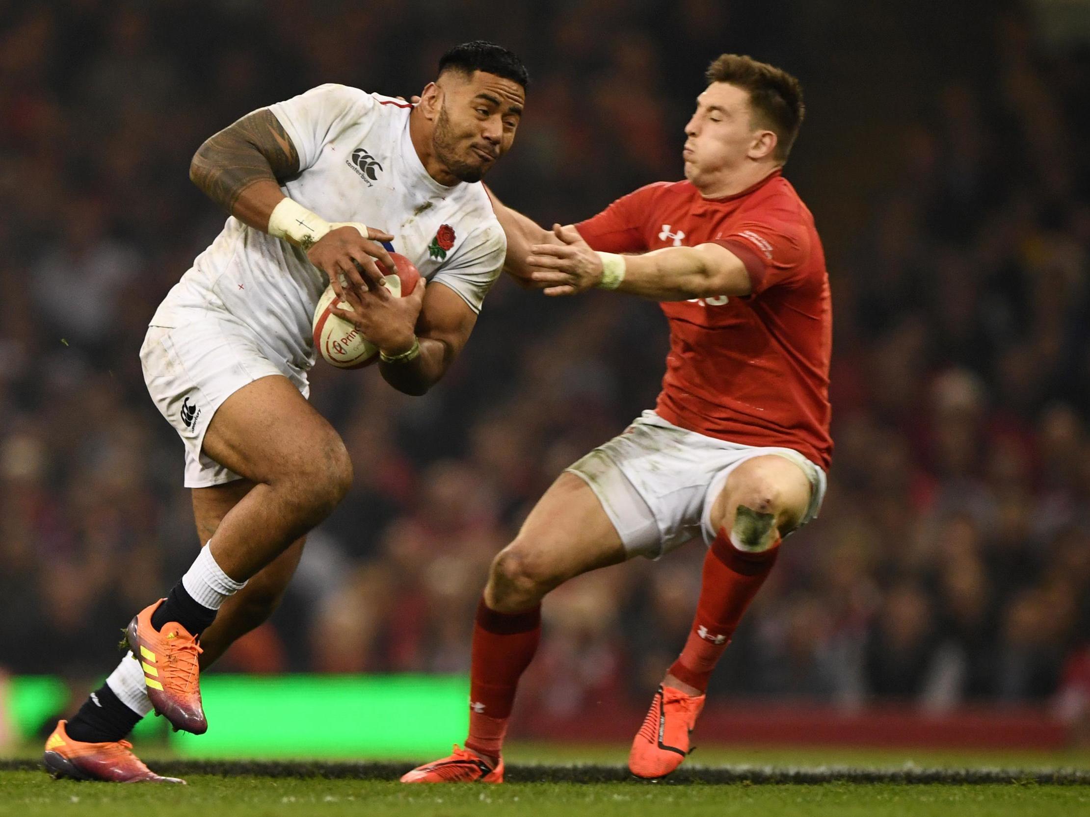 Josh Adams attempts to stop Manu Tuilagi in his tracks