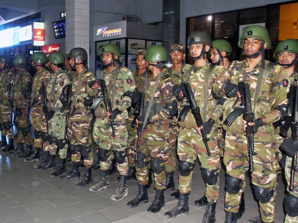 Bangladeshi security forces stand guard at Chittagong airport