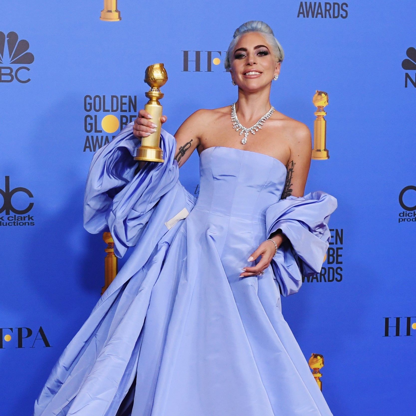 Lady Gaga poses with the trophy in the press room during the 76th Annual Golden Globe Awards (Getty)