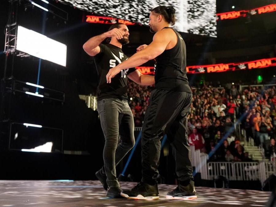 Reigns was embraced by close friend Seth Rollins.