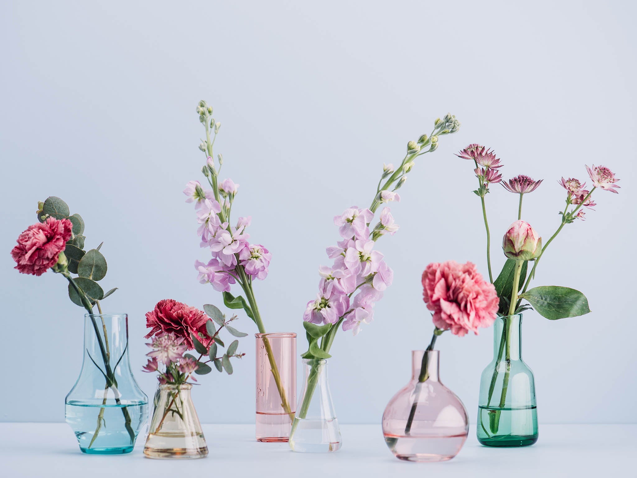 Little squat vases come in handy for those smaller stocky blooms, such as short stemmed hydrangeas