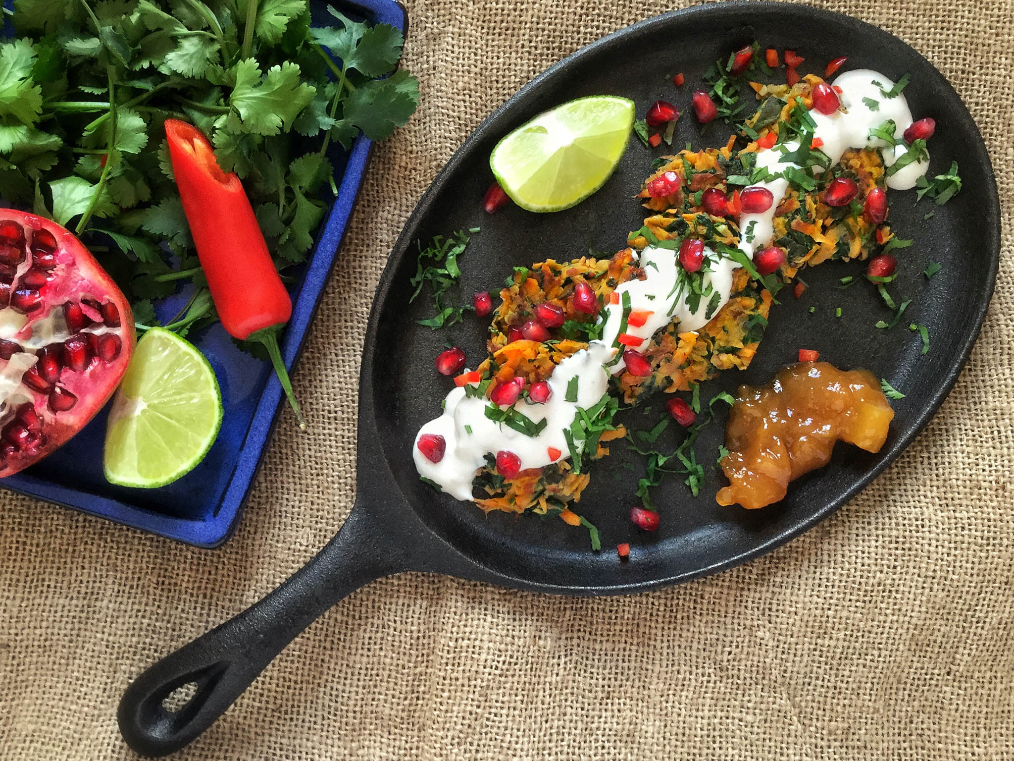 Top with yogurt, pomegranate seeds, chopped coriander and a few red chilli slices