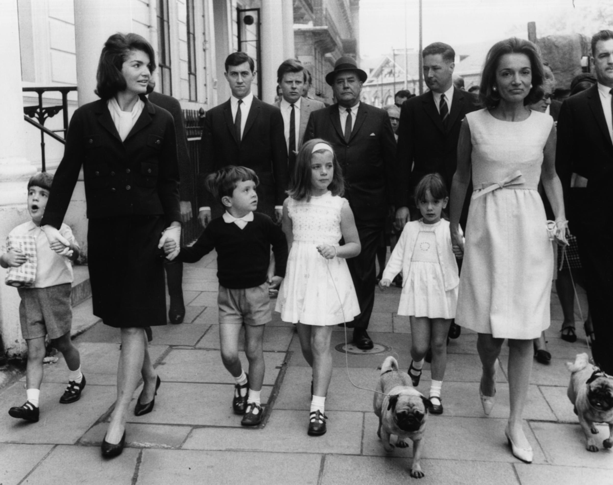 Radziwill (right) with sister Jackie Kennedy and Jackie's children visiting London in 1965