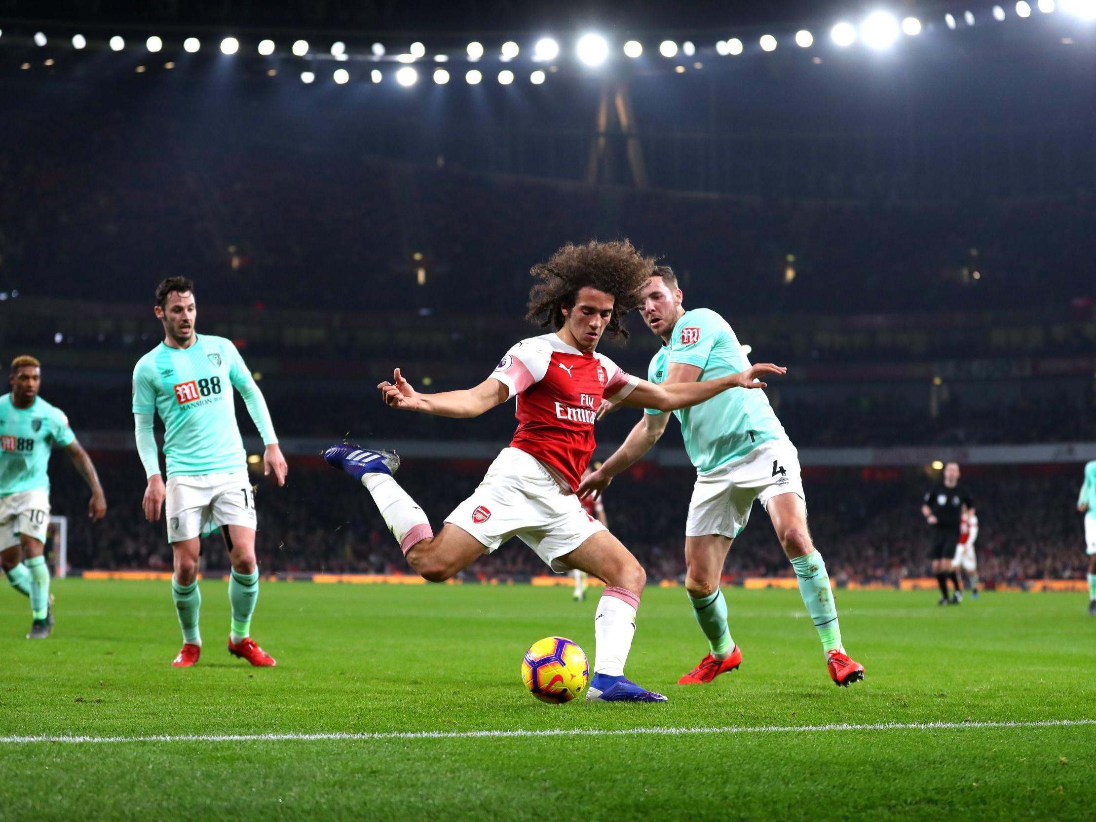 Matteo Guendouzi attempts to put the ball into the Bournemouth box as Dan Gosling closes him down