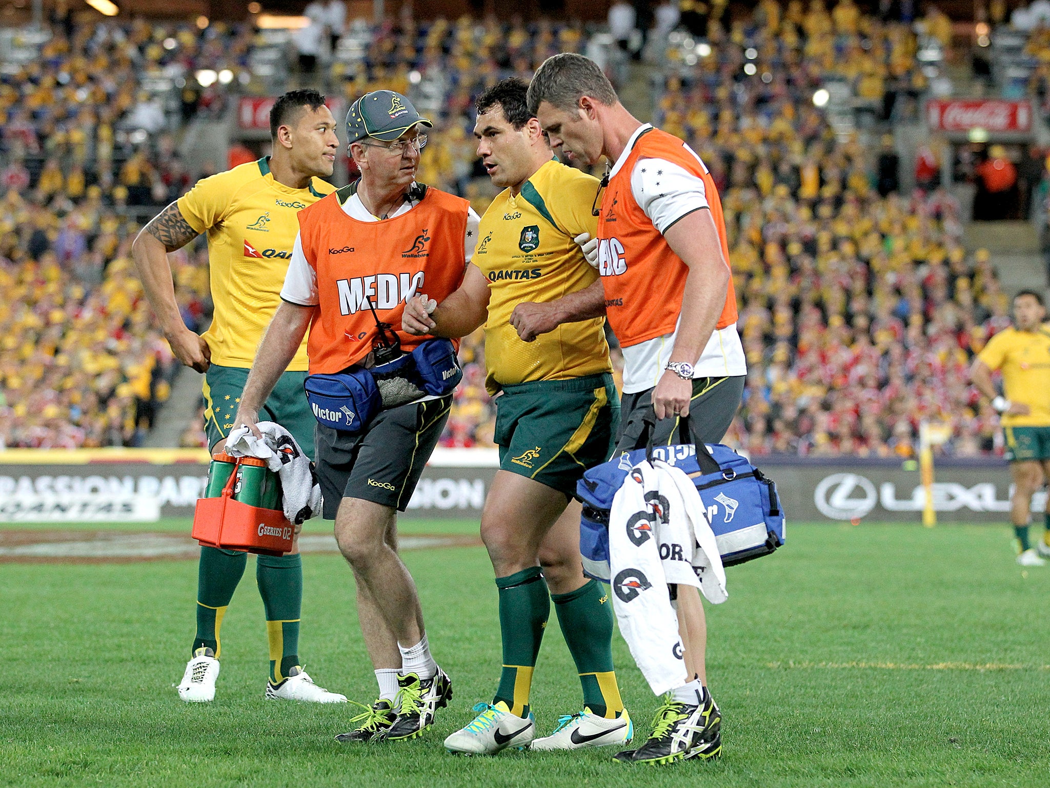 Australia’s George Smith is helped off after suffering a fearful head clash against the Lions in 2013. Five minutes later he was back on the pitch, having somehow passed the concussion tests