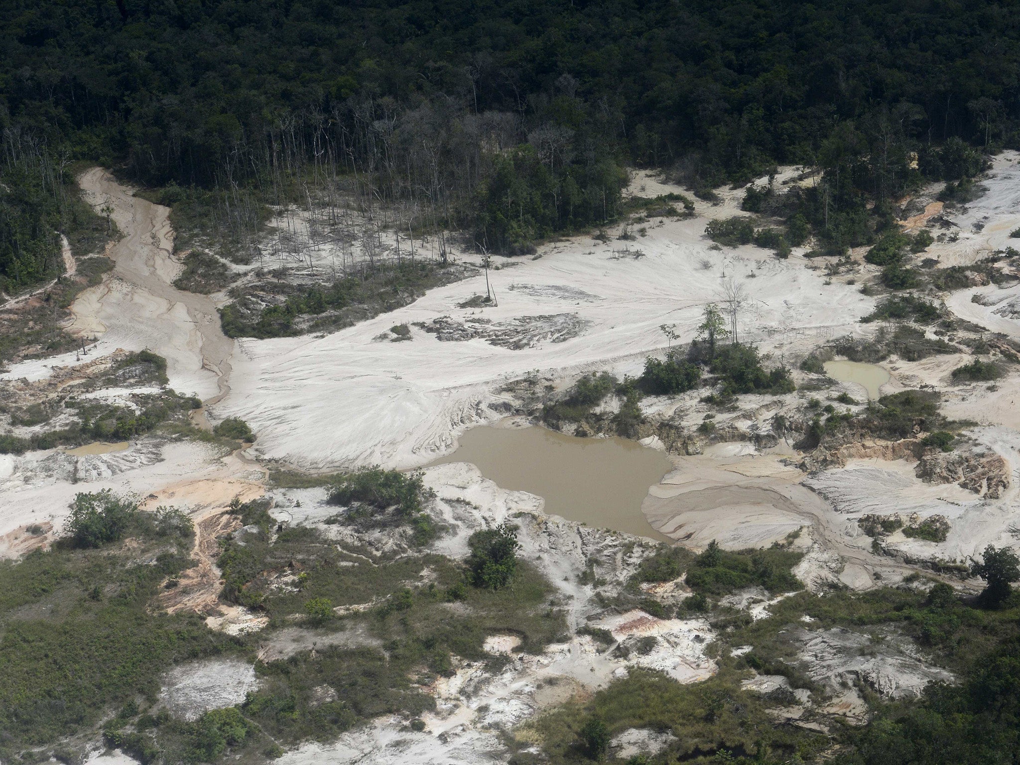 Aerial view of an illegal mine located in Canaima National Park, Bolivar State