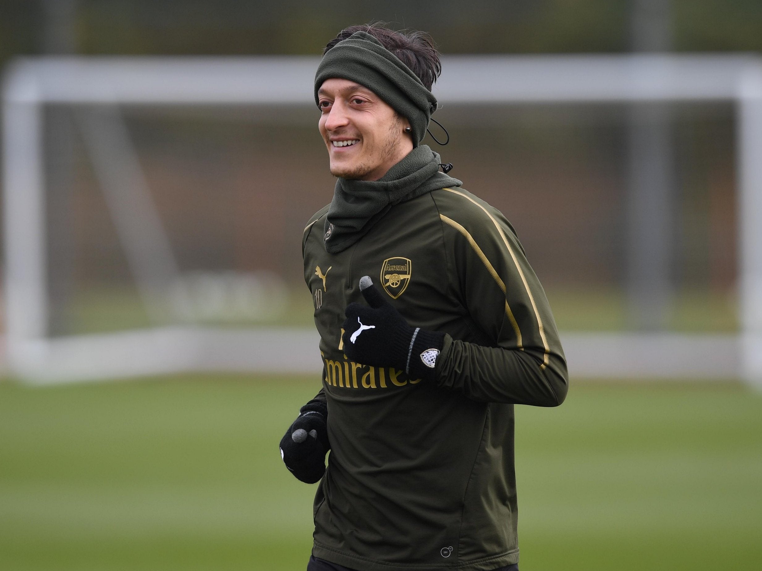 Mesut Ozil trains ahead of the north London derby